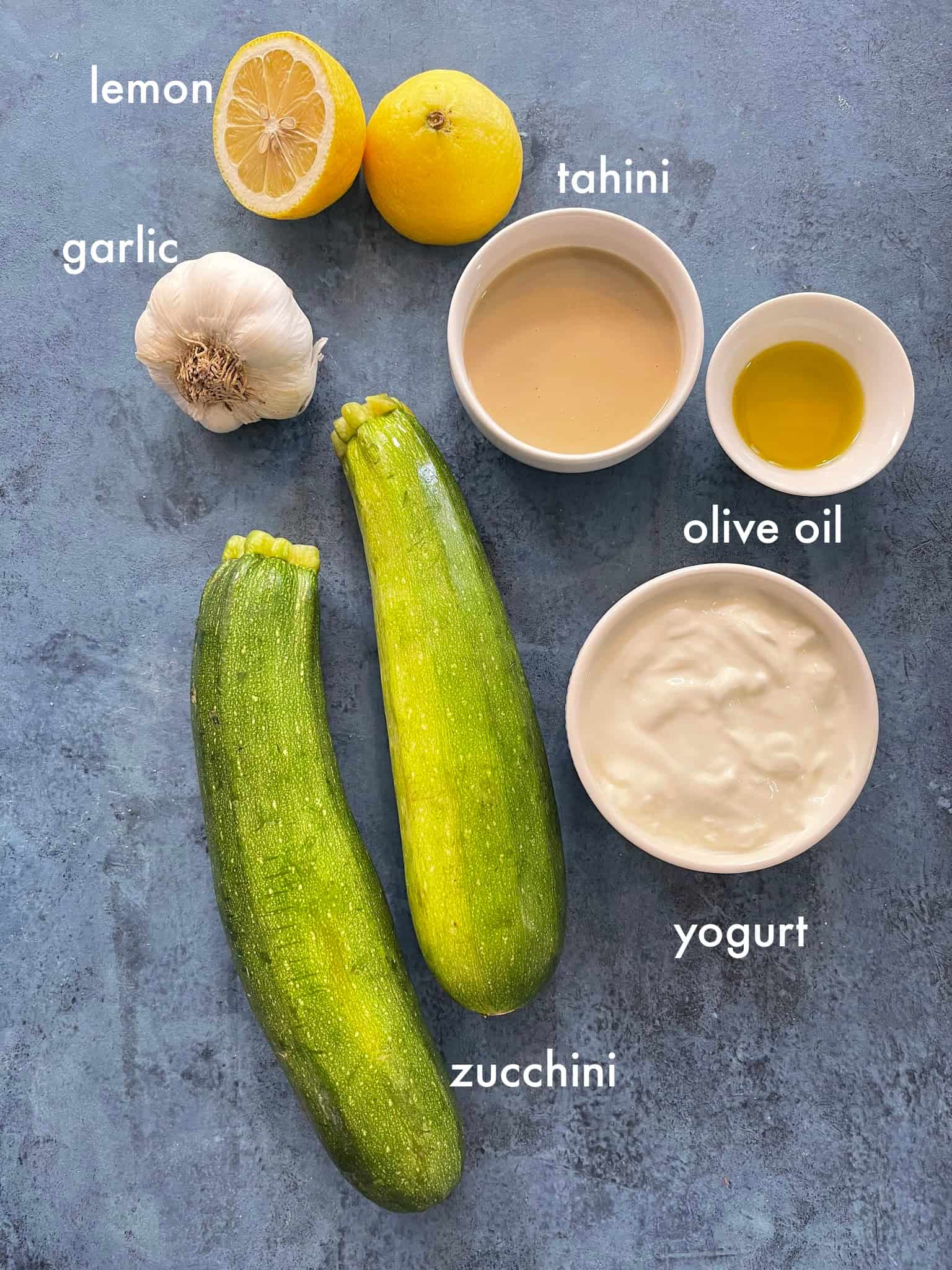 To make this recipe you need zucchini, olive oil, yogurt, tahini, lemon juice and garlic. 