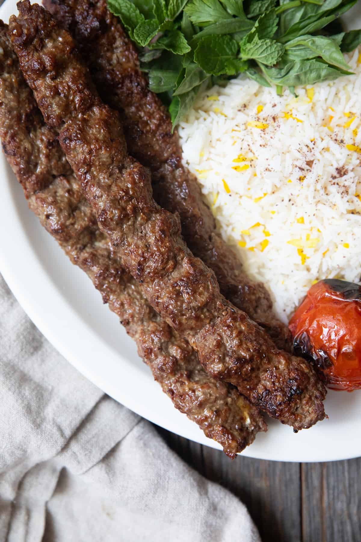 Close up shot of kabob koobideh. 