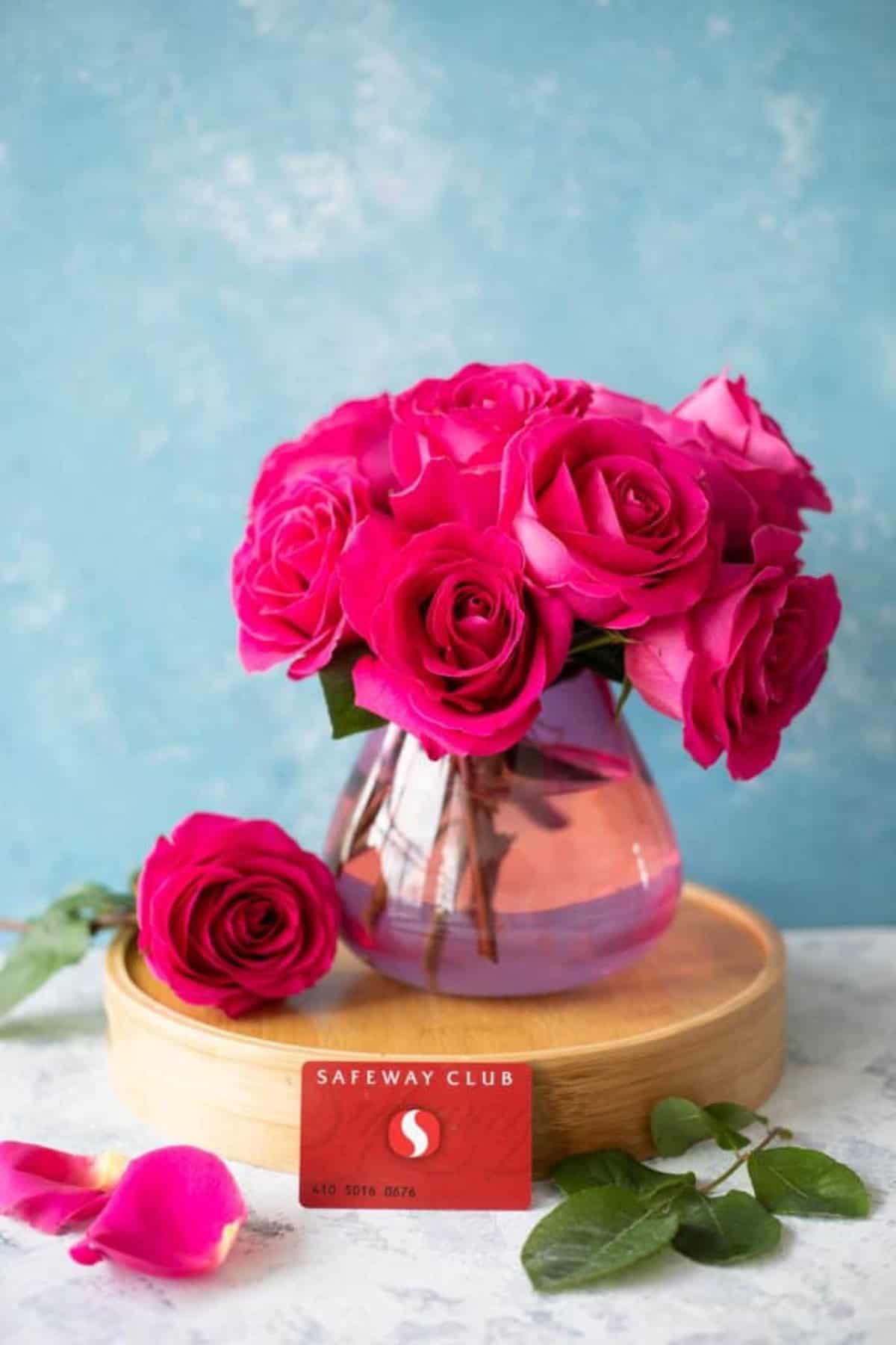 A bouquet of flowers with Safeway card.