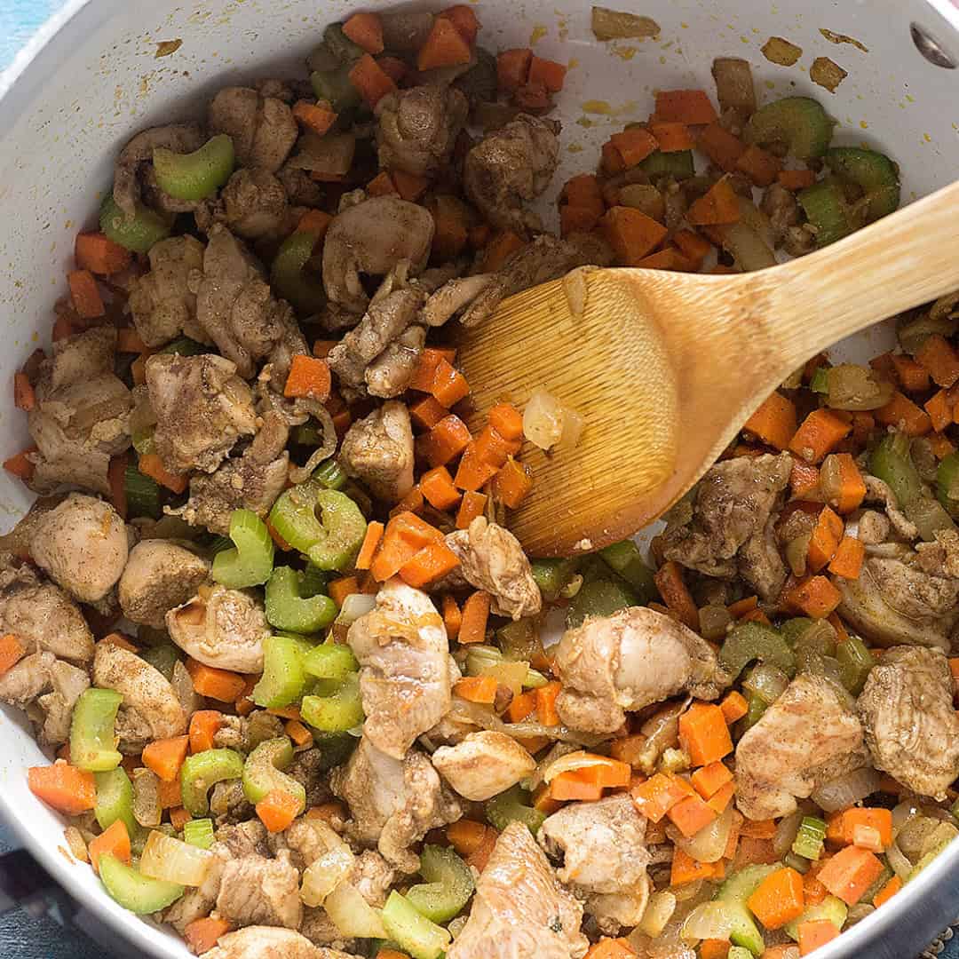 Add the chicken: Add in boneless skinless chicken thighs that are cut into small pieces followed by the spices.