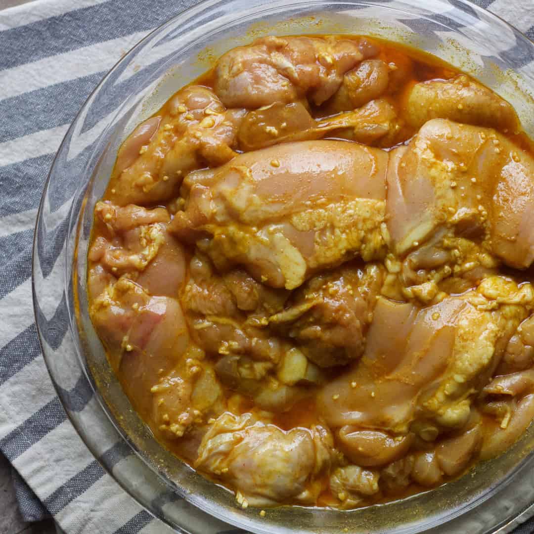 Marinate the chicken: Mix all the spices in a large bowl and add in olive oil, lemon juice and garlic. Mix well and then add the chicken to the marinade. Let it marinate for 30 minutes or overnight.
