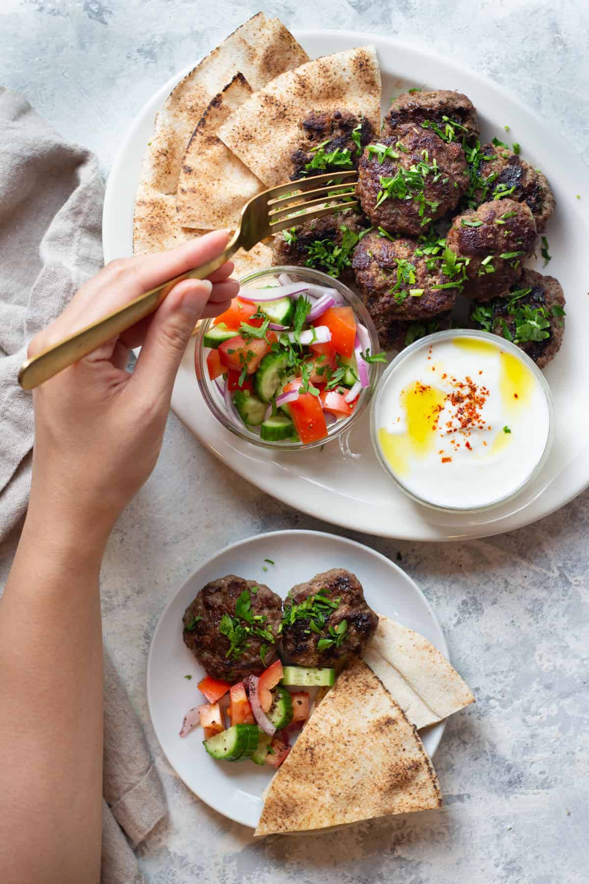 This is the best kofta kebab recipe! So easy and simple, made with just a few ingredients and ready in no time! These koftas are juicy and so delicious. For the perfect meal serve them with pita, salad and a delicious yogurt sauce. 