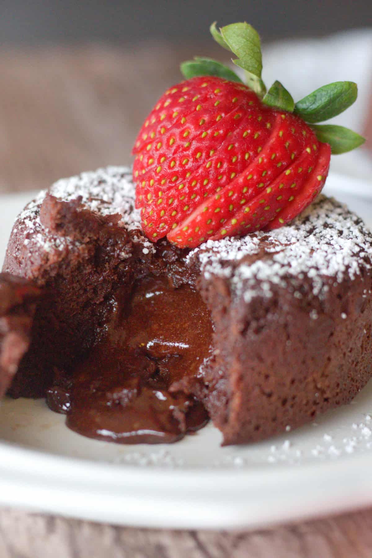 Molten lava cake with a gooey center full of chocolate. It's easy and tasty! 
