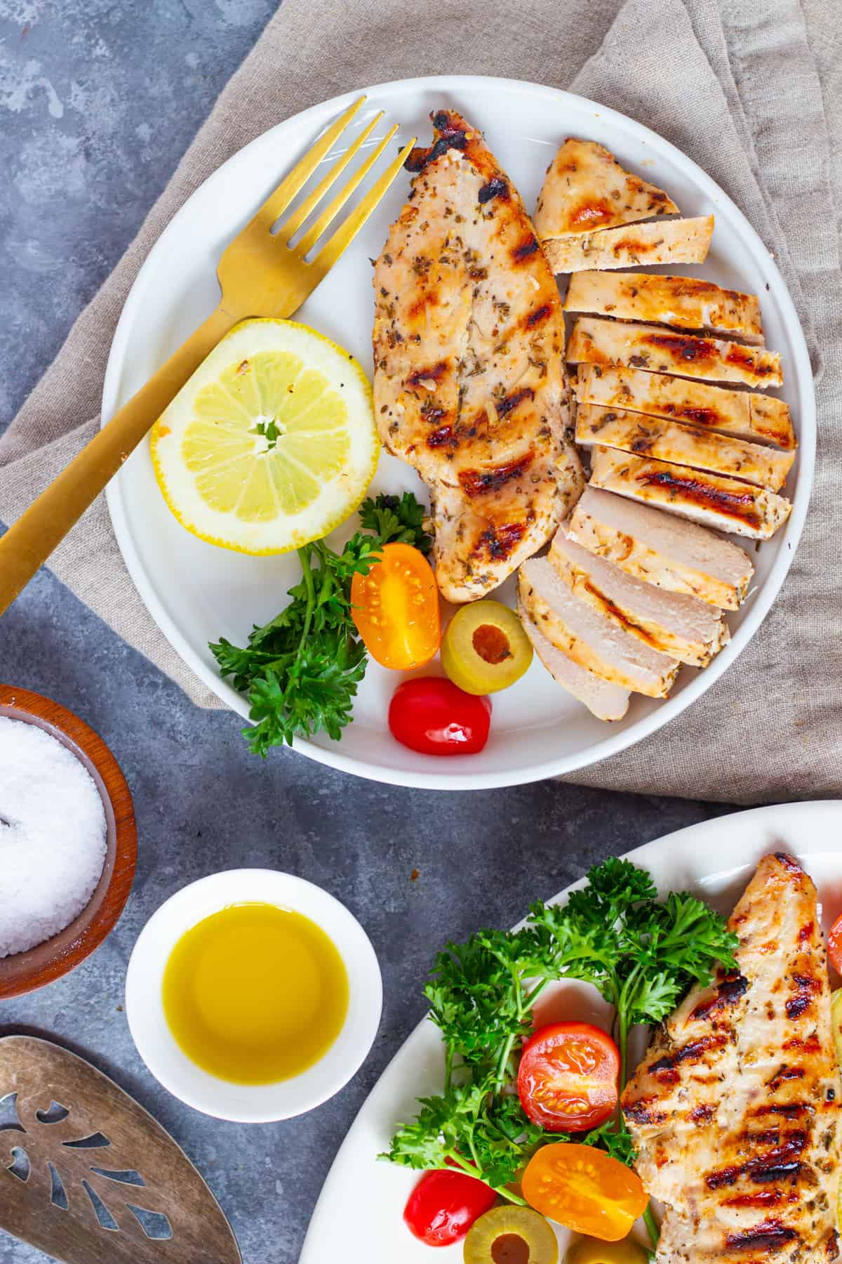Juicy grilled chicken slices easily and can be served on its own or with salad. 