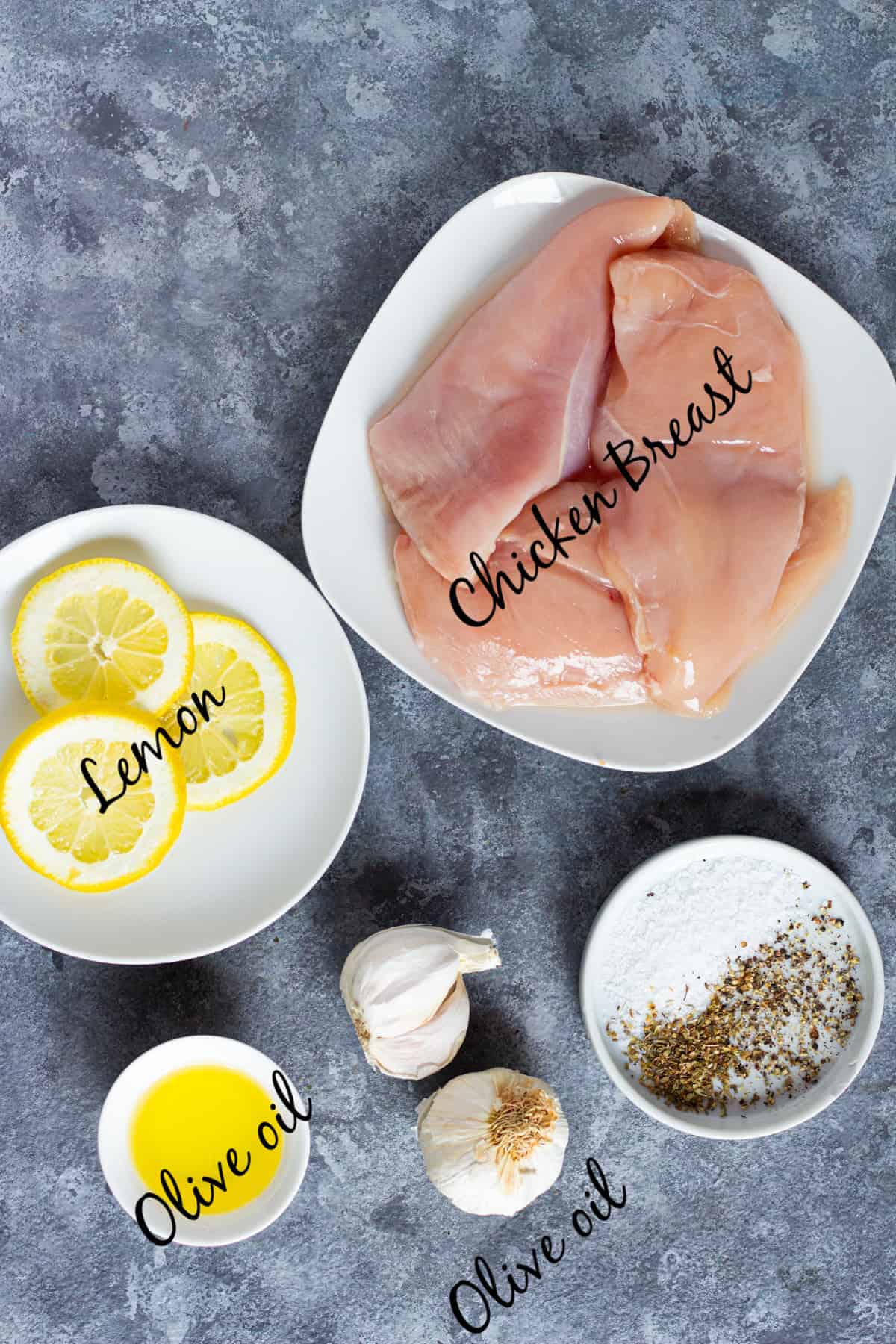 The ingredients to make this recipe are chicken breast, lemon, olive oil, garlic, oregano, salt and pepper. 