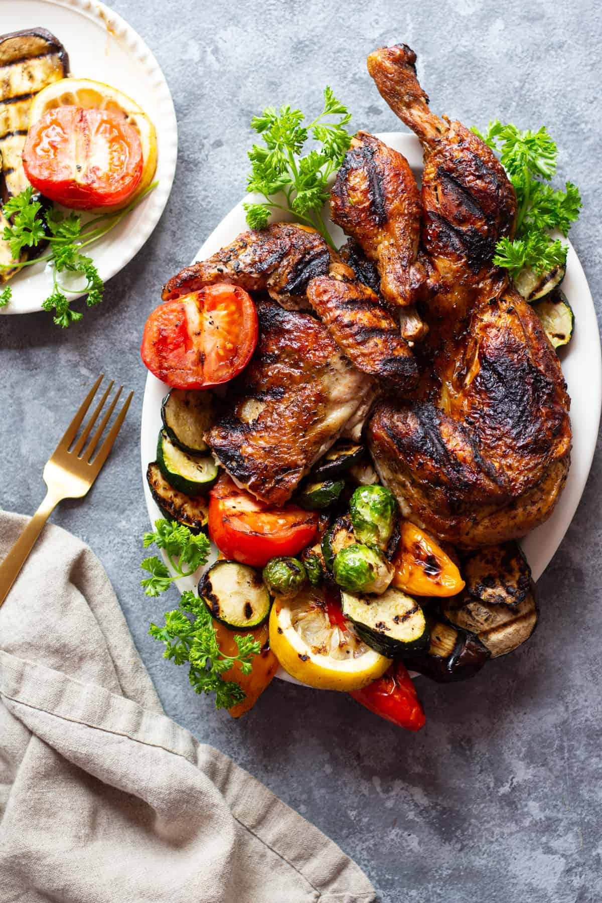 Grilled spatchcock chicken is easy to infuse with Mediterranean flavors! Juicy on the inside and crispy on the outside, every bite of this chicken is delicious.
