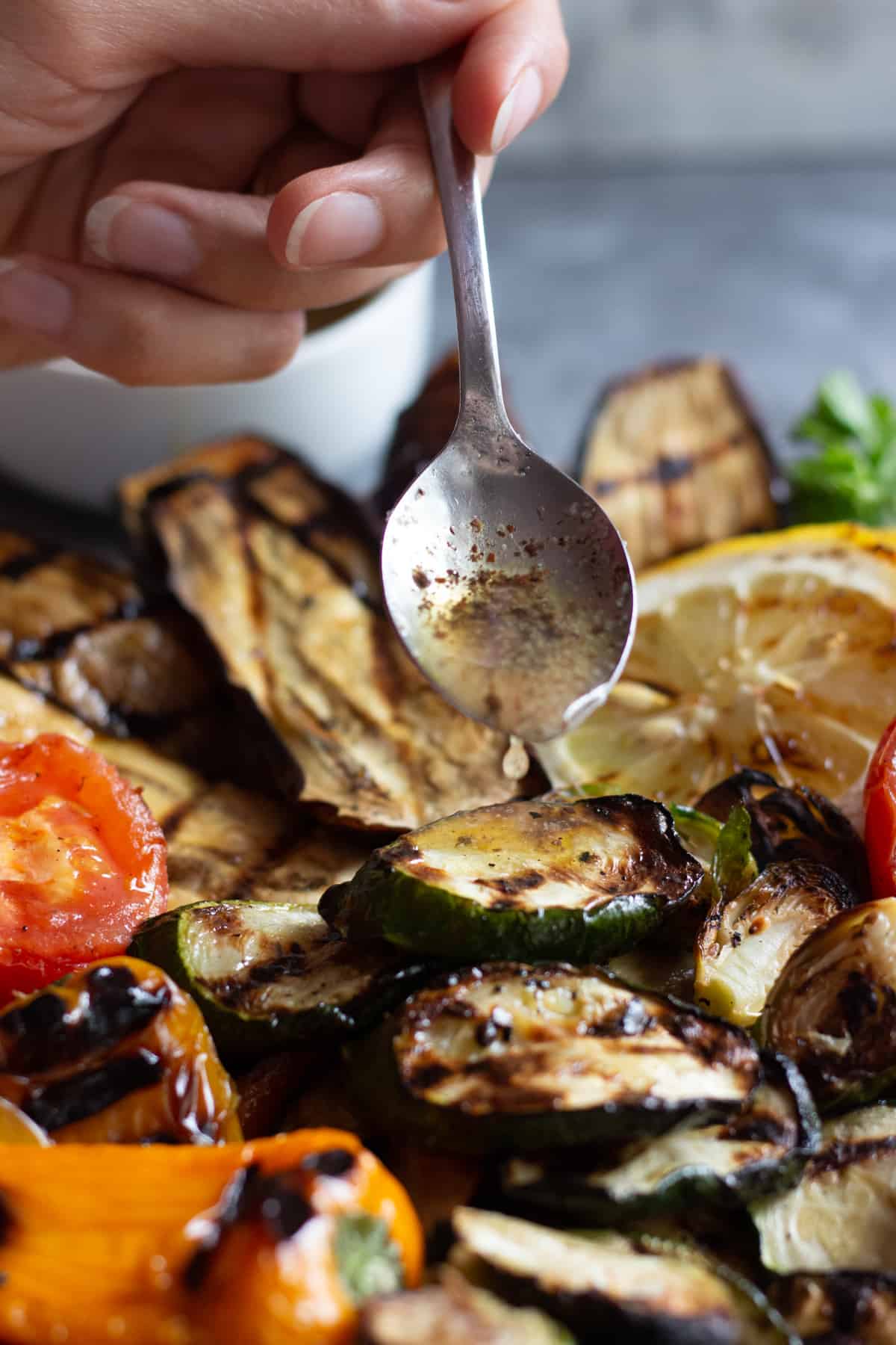 A zesty vinaigrette drizzle on zucchini.