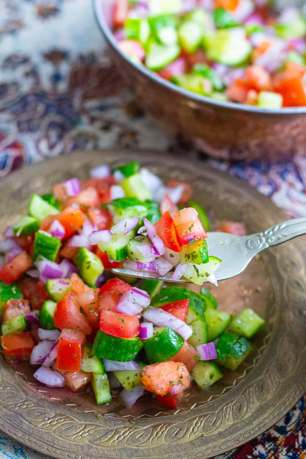 Salad Shirazi is a Persian cucumber tomato salad that's easy to prepare and packed with flavors. This classic Persian salad can be served with any main dish. 