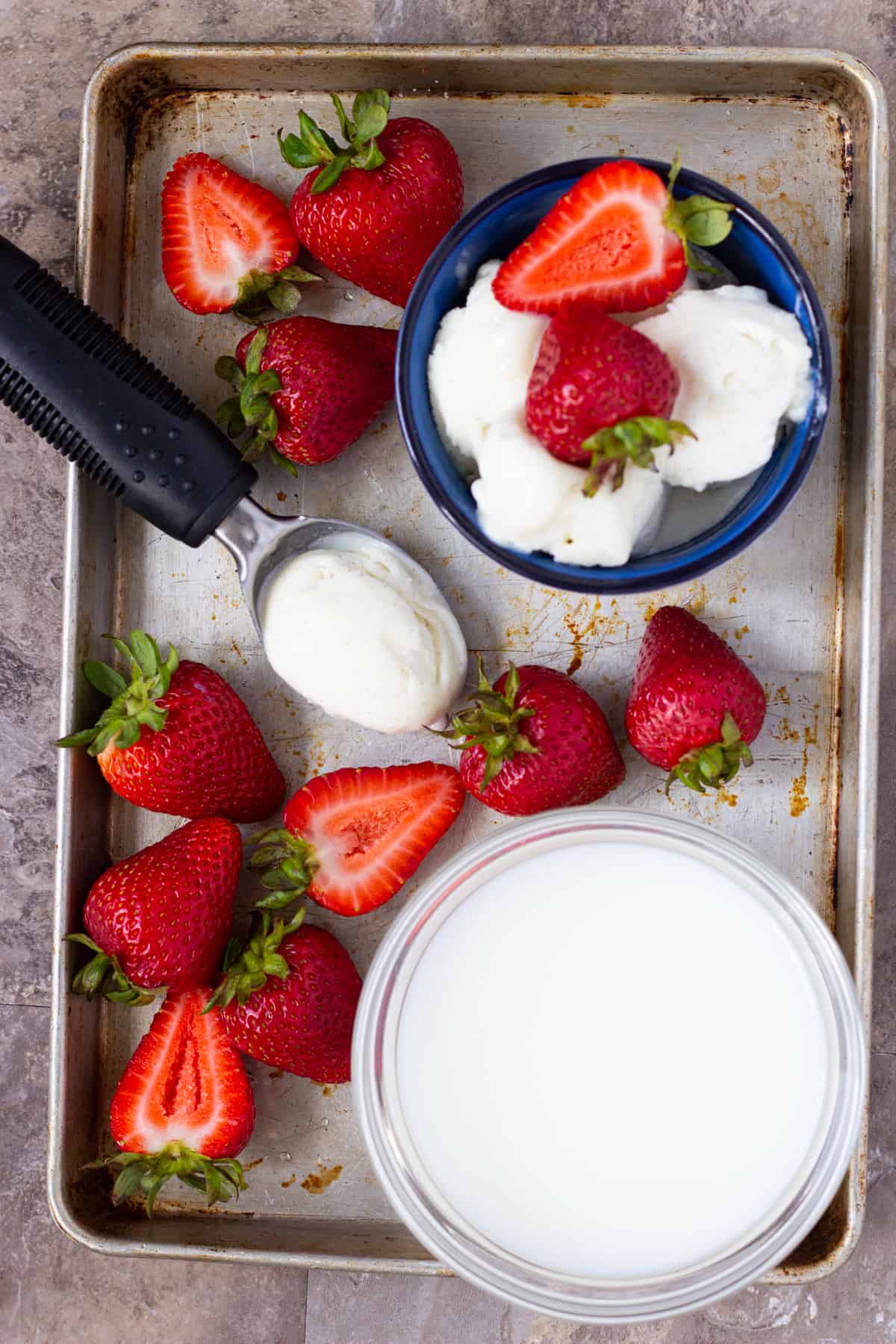 strawberry milkshake ingredients are milk, vanilla ice cream and strawberries 