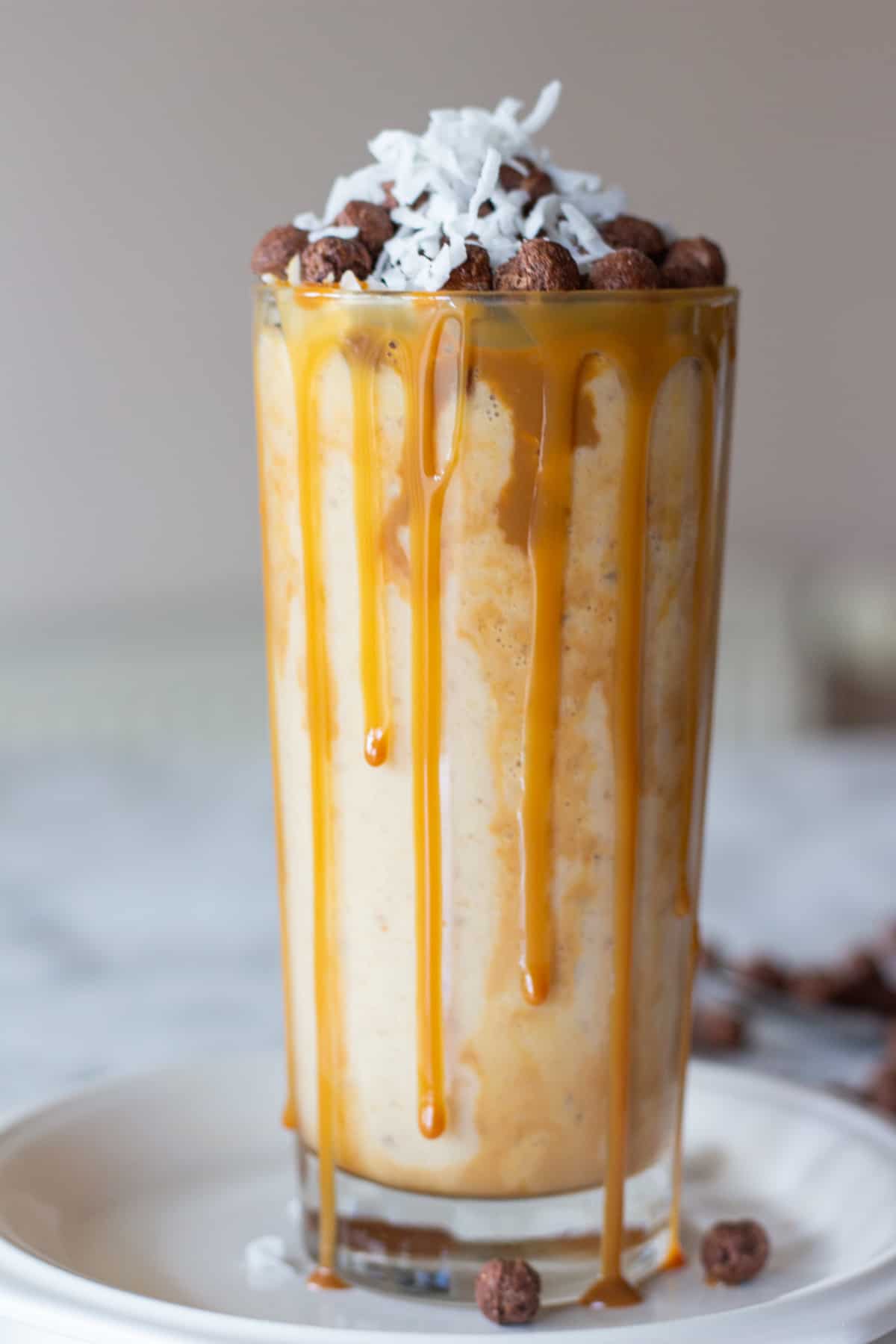 This Banana Peanut Butter Coco Puff Milkshake will make your breakfast more exciting and delicious because it has all the best flavor combinations in one tall glass!