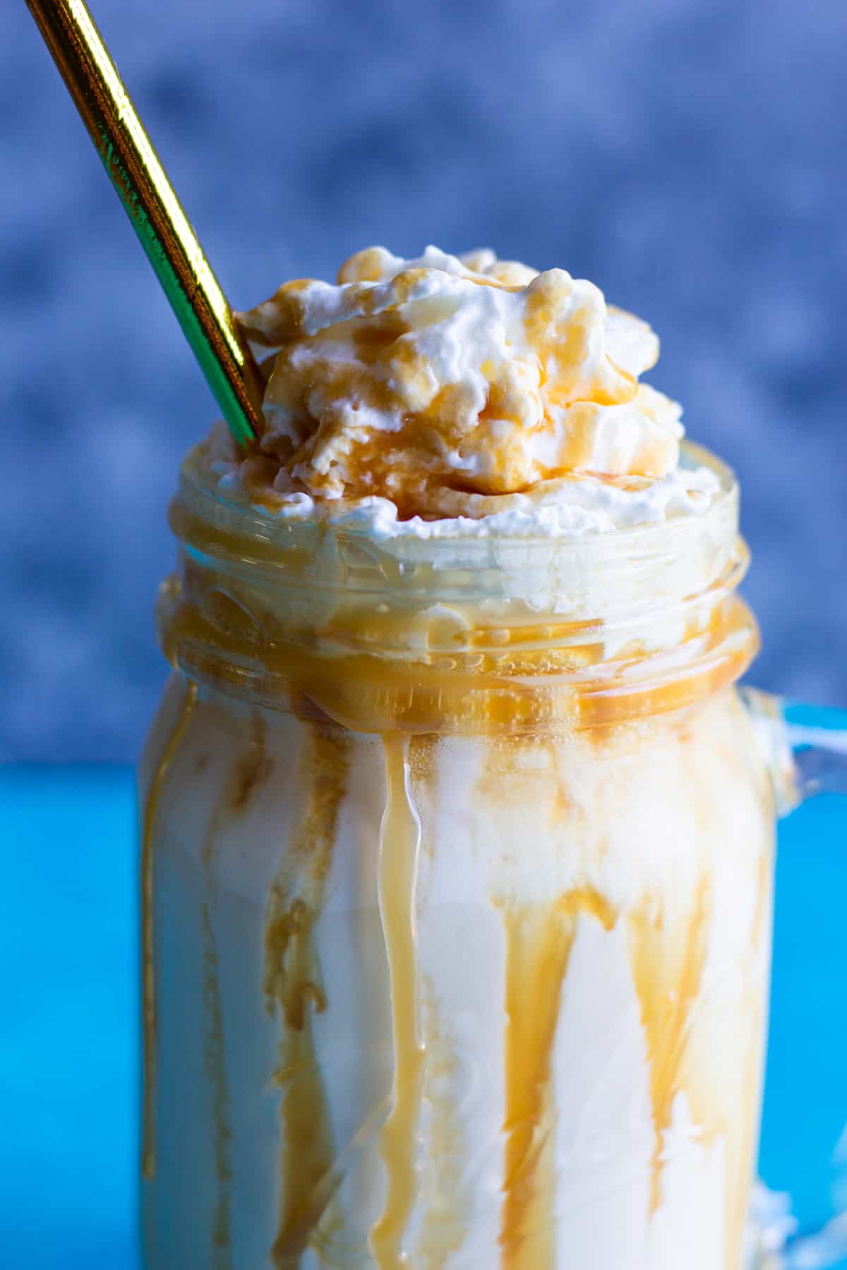 homemade milkshake made with caramel sauce and vanilla ice cream. 