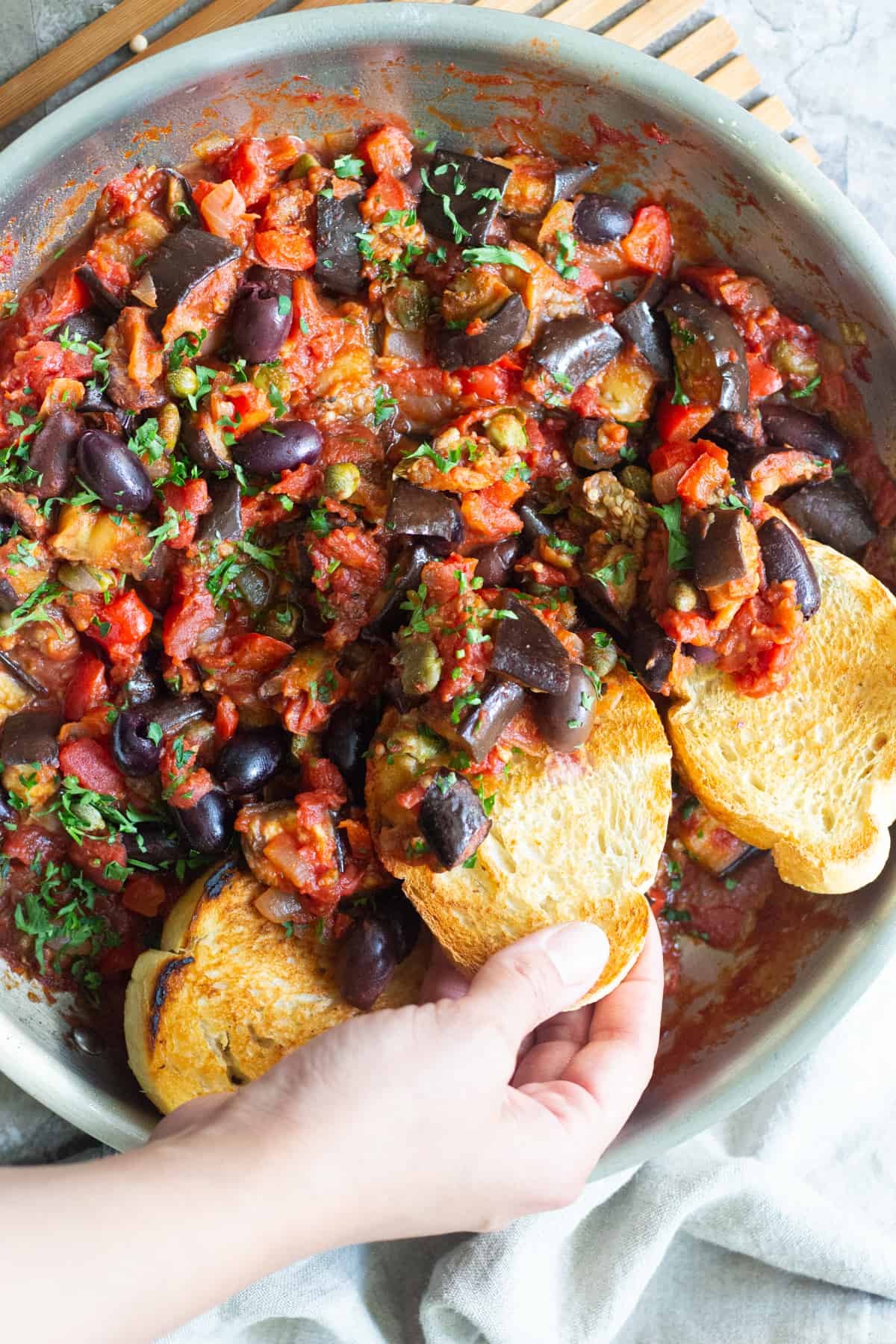 Eggplant caponata is an easy recipe that's full of flavor. This vegetarian eggplant recipe is made with fresh vegetables and is very simple to make. 
