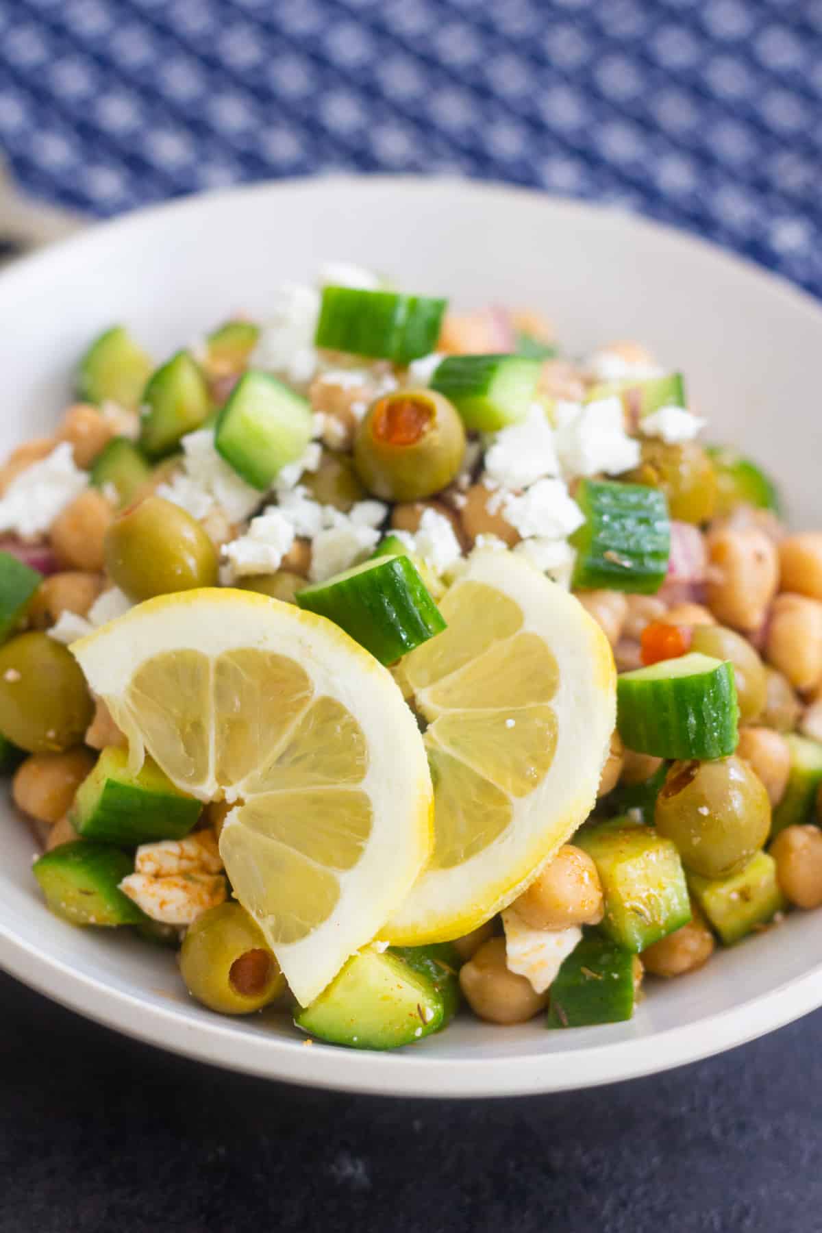 chickpea salad recipe is easy and topped with olives and feta cheese. 