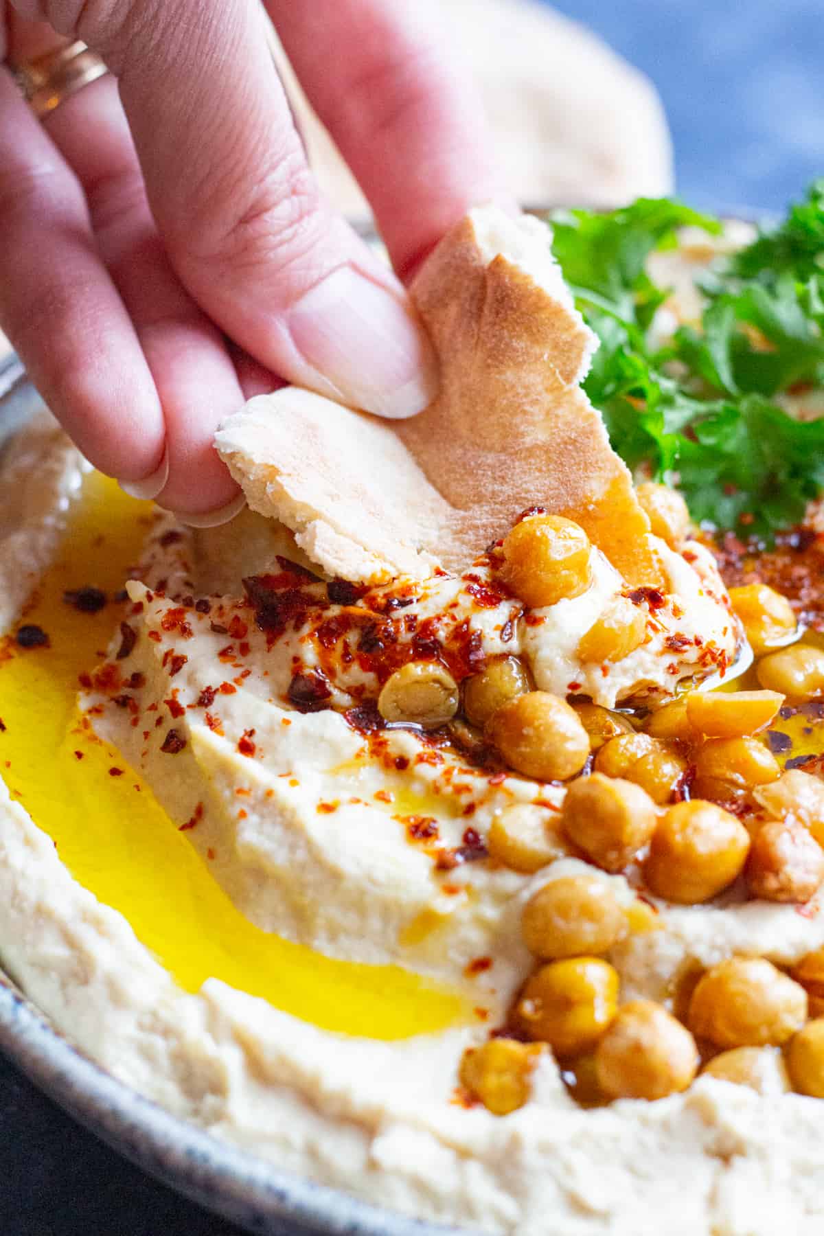 This is the ultimate homemade hummus recipe. It’s smooth and creamy with a bright flavor, and pairs perfectly with bread! Follow along for tip and tricks, a video tutorial and complete details!
