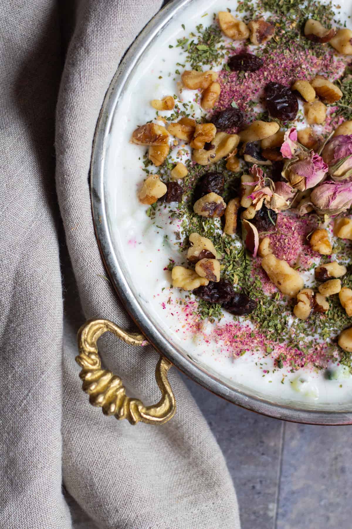 Top Mast o Khiar with walnuts, raisins and rose buds.