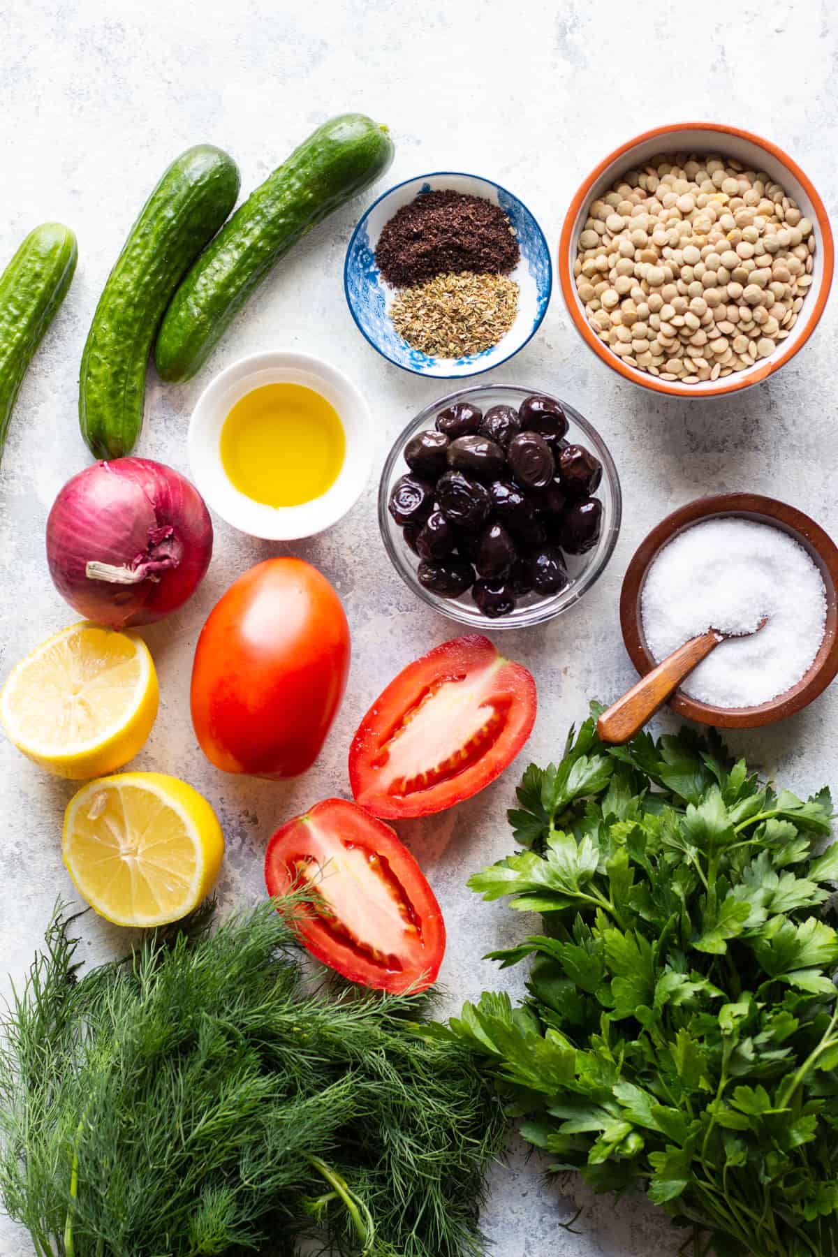 Ingredients shot contains herbs, salt, olives, lemon, onion, tomatoes, lentils, cucumbers and spices. 