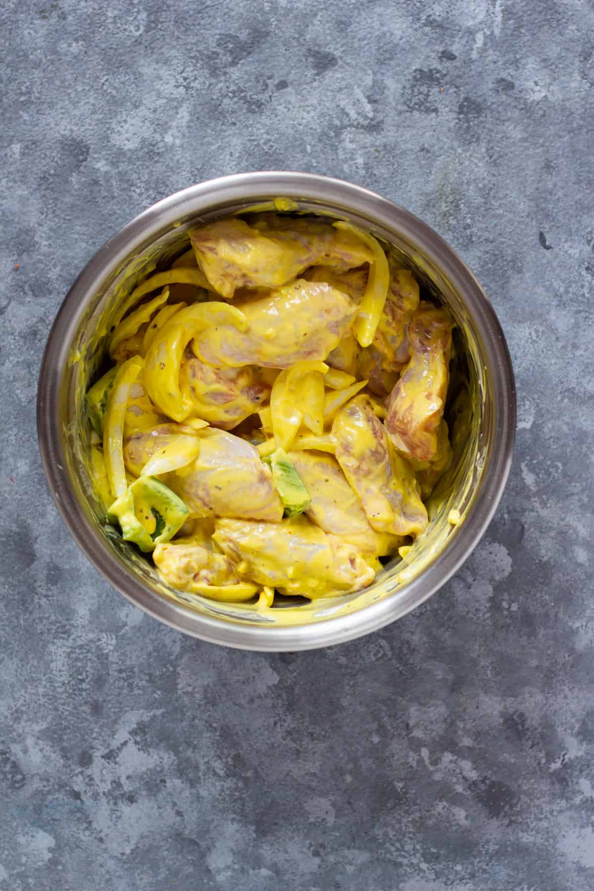 The chicken wings are marinated in a saffron yogurt mixture which will also make them very tender. 