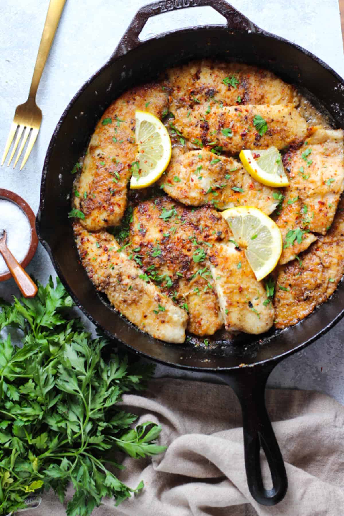 Ready in 30 minutes, this garlic lemon tilapia recipe makes the perfect dinner. This is one of the best tilapia recipes out there and it's so easy to make!
