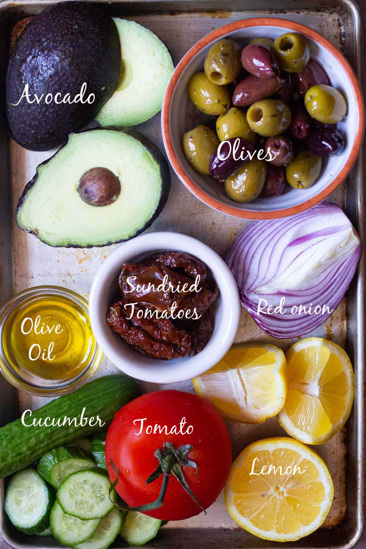 to make avocado salad you need avocado, olives, olive oil, tomatoes, cucumbers, sun dried tomatoes and onion. 