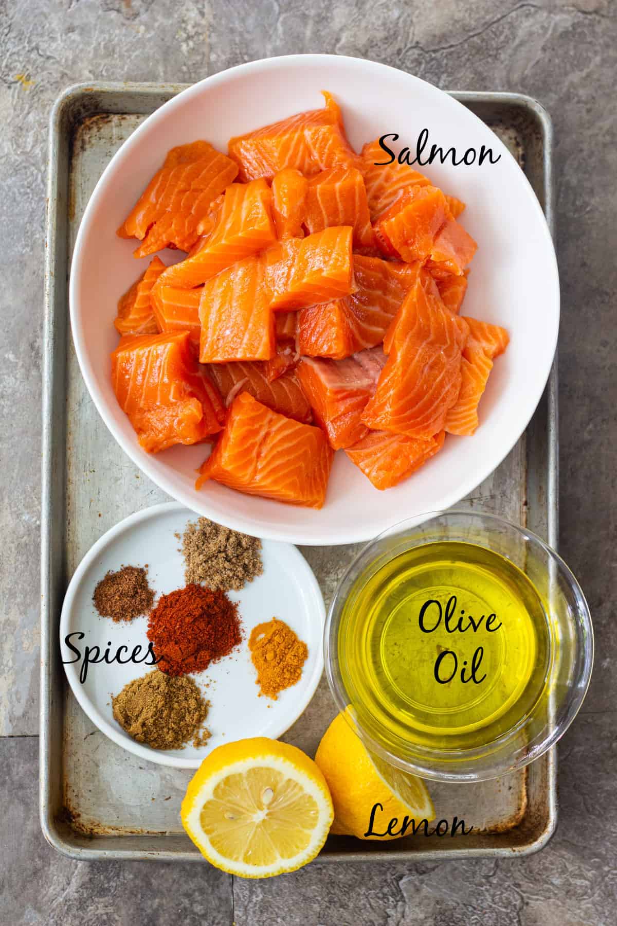 to make salmon kabobs you need salmon, spices, olive oil and lemon. 