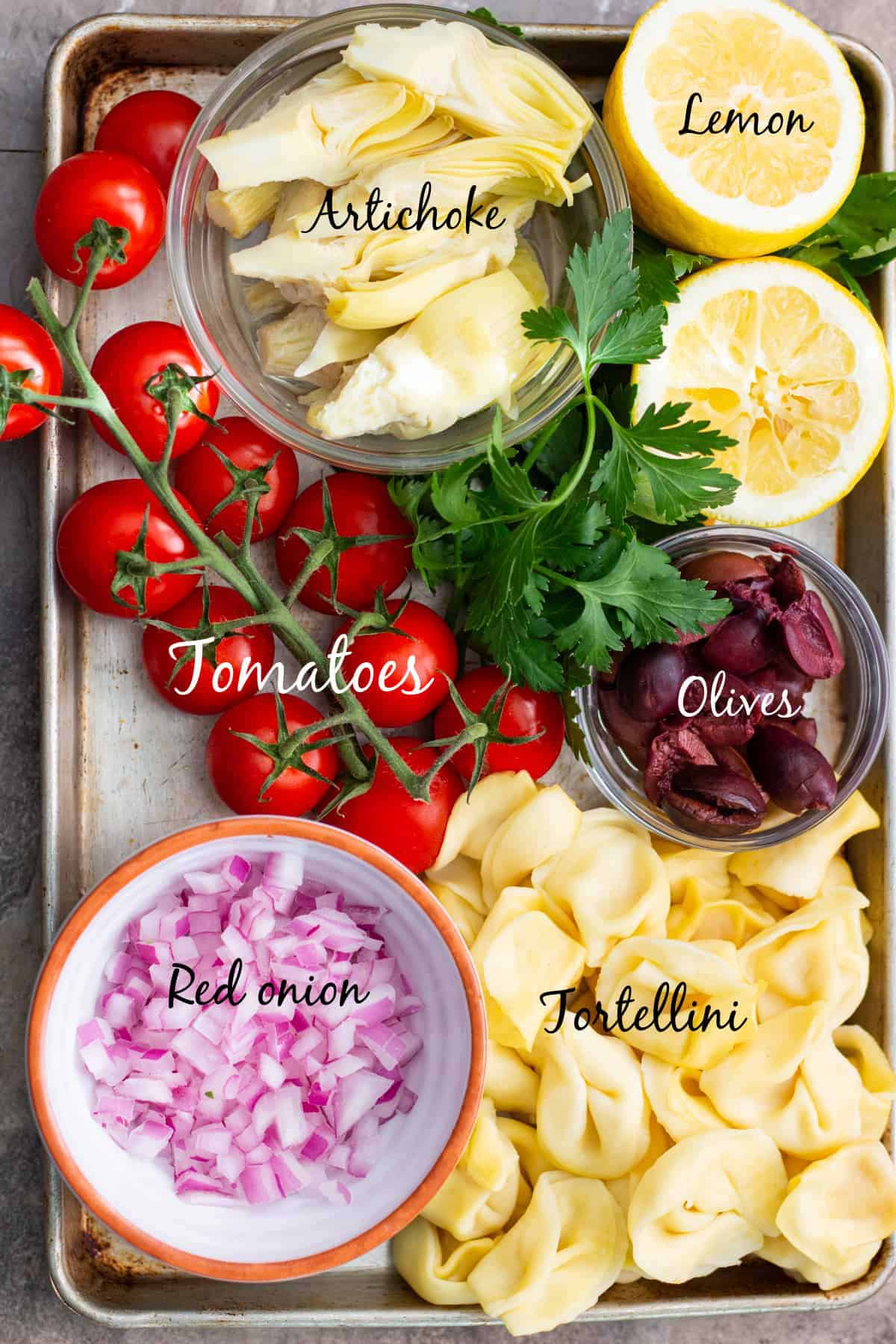 Ingredients to make Mediterranean tortellini salad.