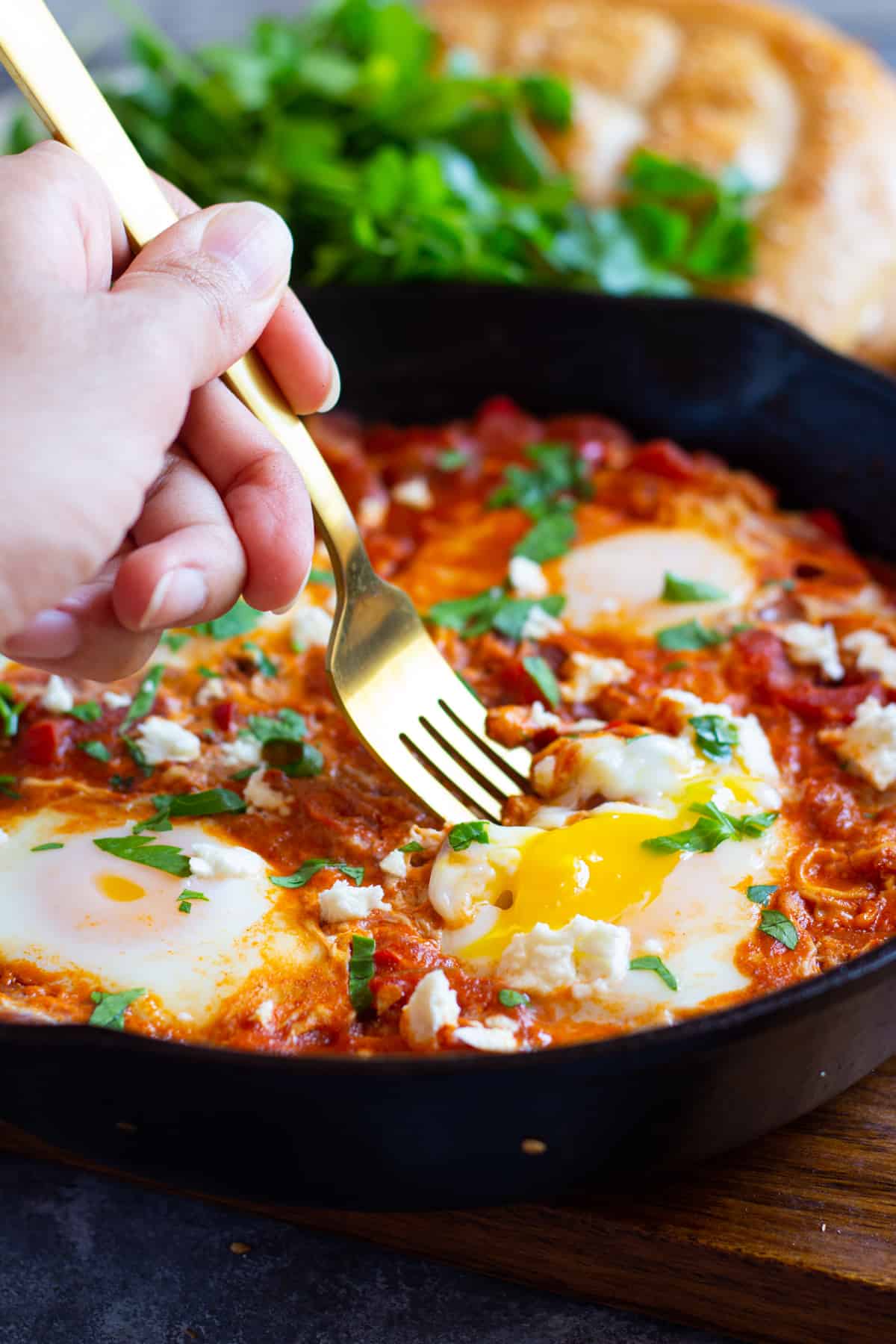 A fork serving shakshuka. 