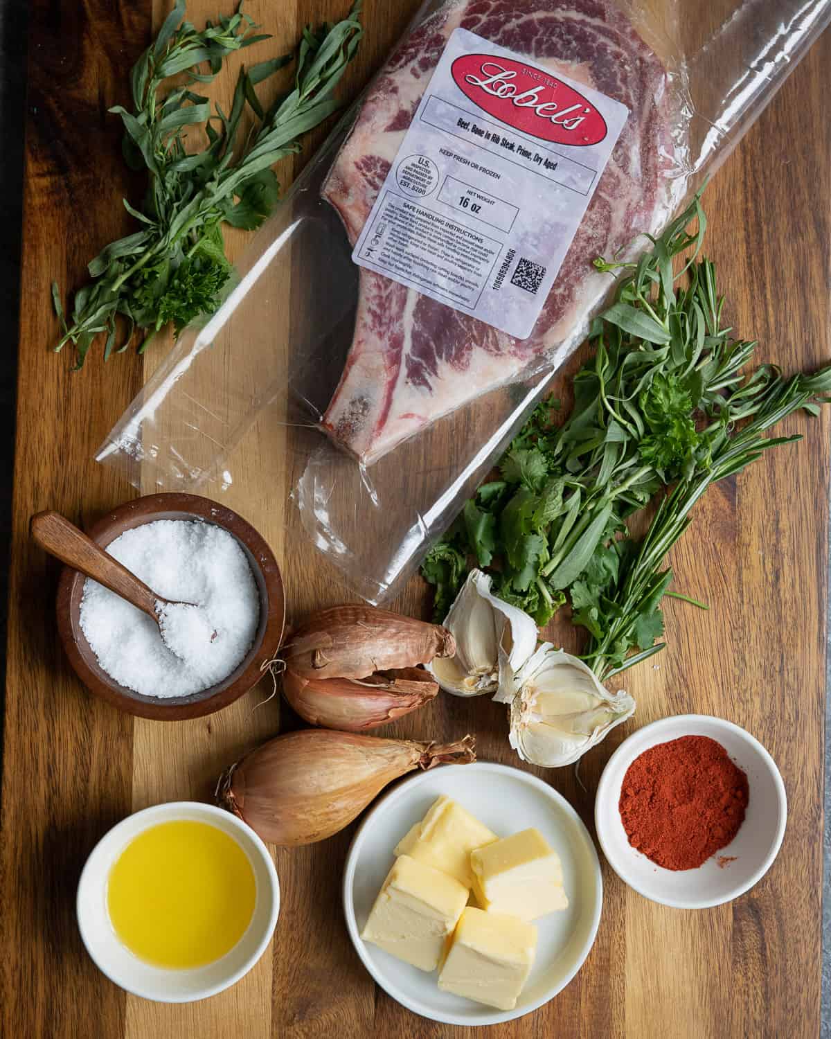 Ingredient shot with steak, herbs, butter, spices and garlic