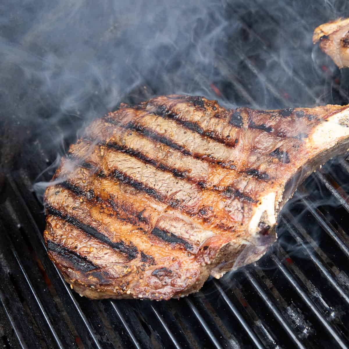 Grill the steak on the charcoal grill on both sides. 