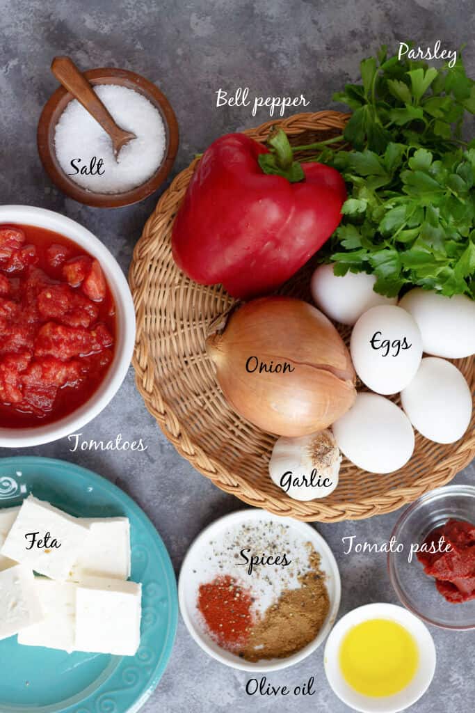 To make shakshuka you need eggs, tomatoes, peppers, garlic and onion plus spices and feta.