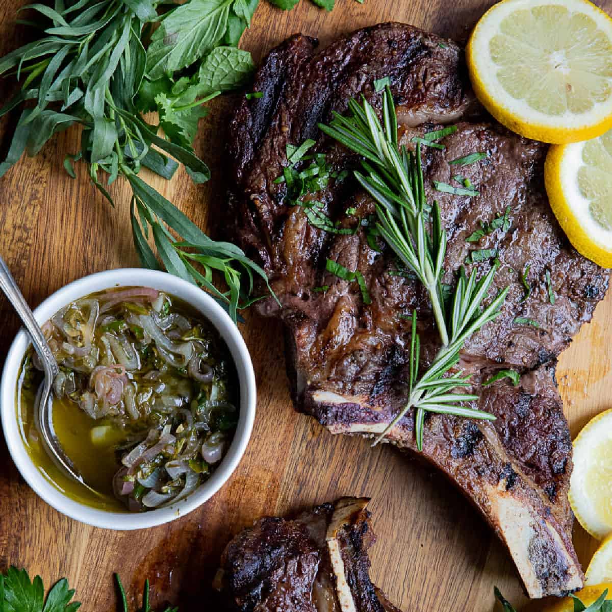 Grilled steak on a wooden board. 