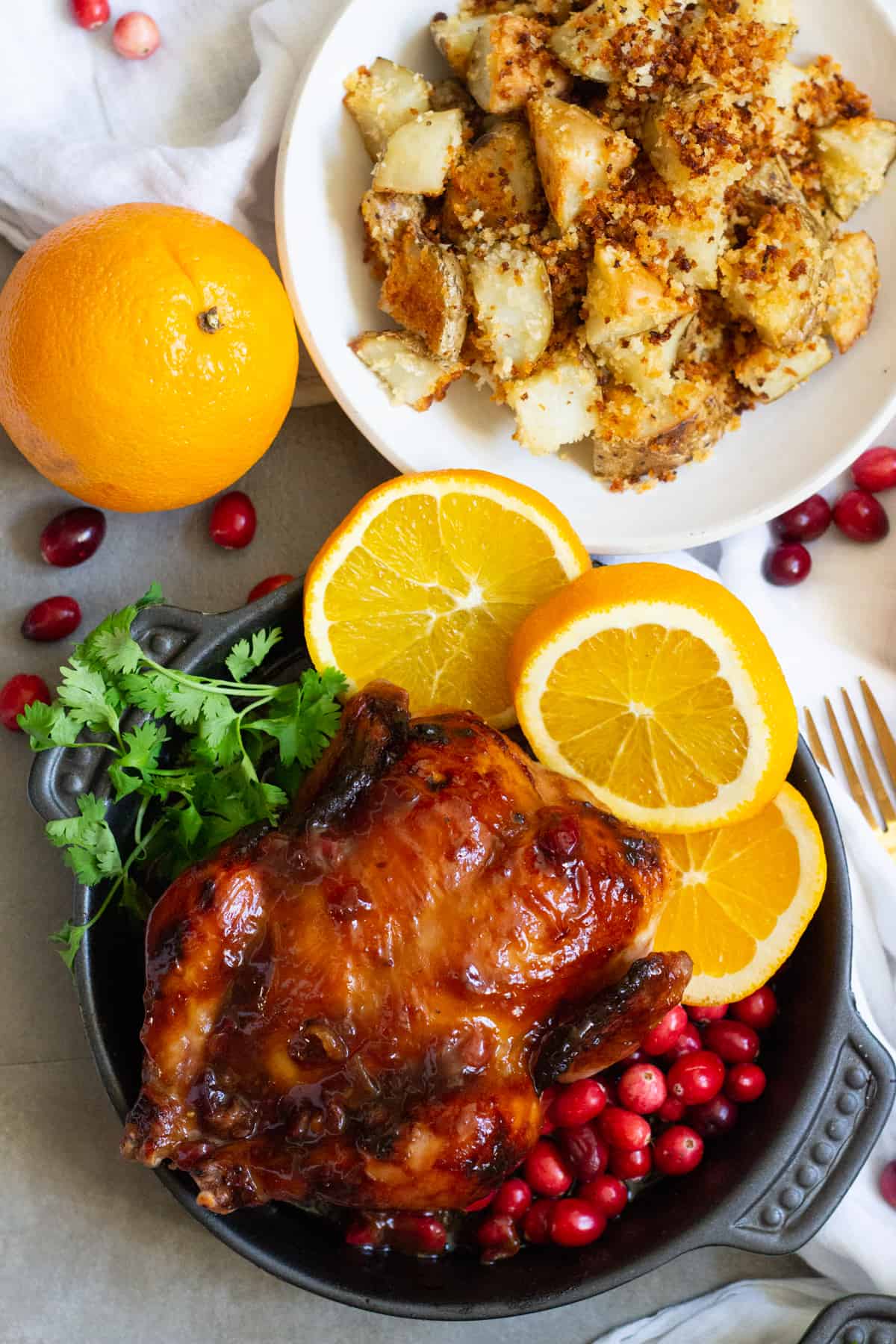 overhead shot game hen with orange. 