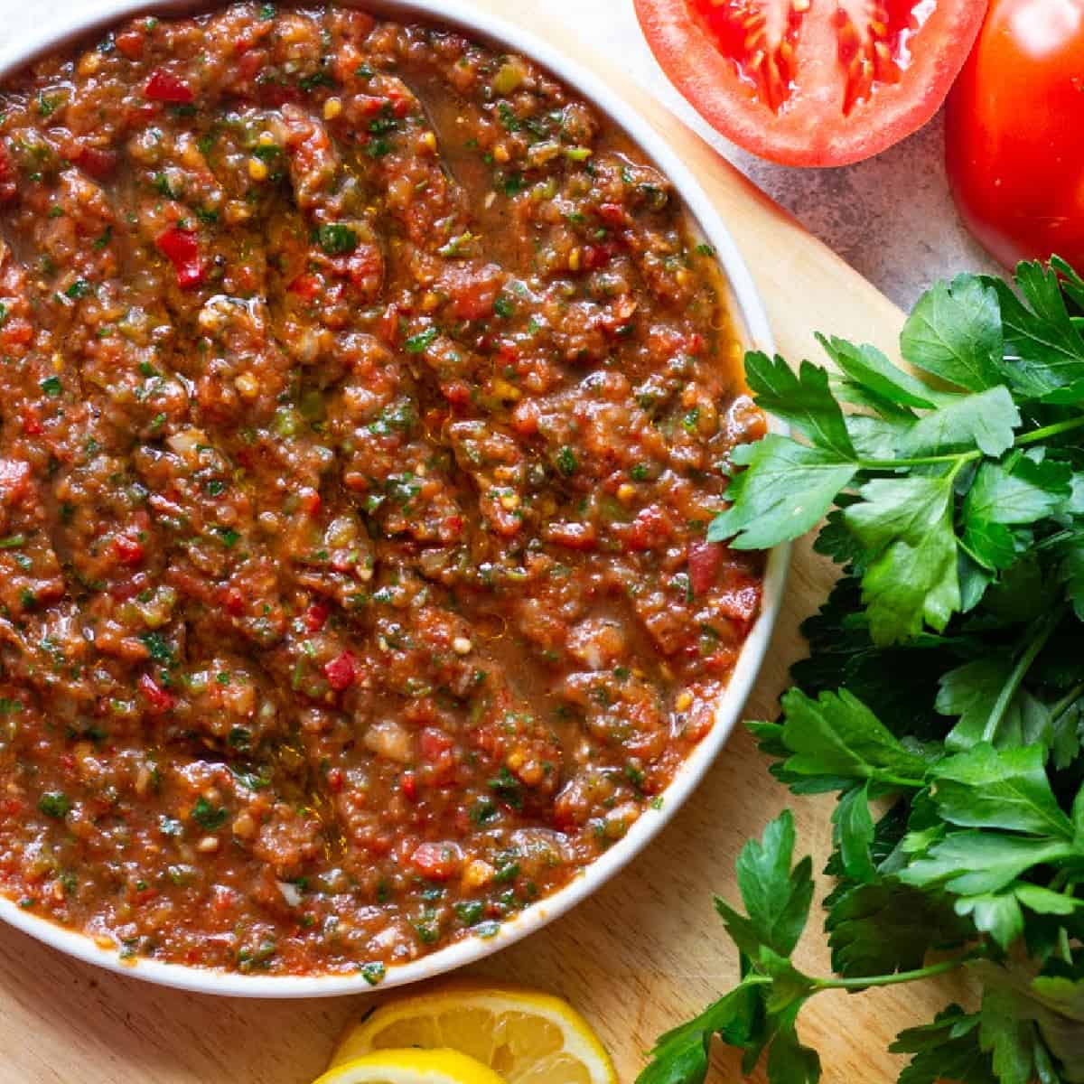 Ezme is a classic Turkish sauce, condiment and appetizer that’s usually served on the side of kebabs with some fresh bread. It’s ready in 10 minutes and is so delicious thanks to tomatoes, peppers and herbs.