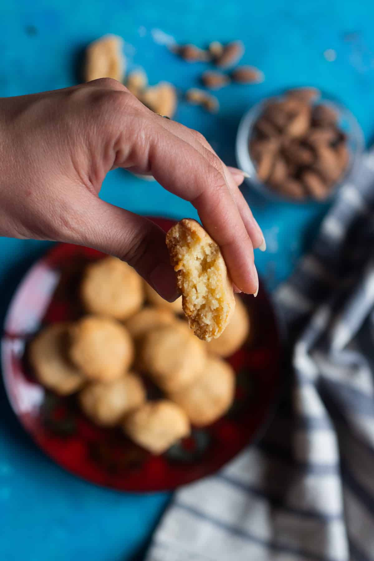 The texture of a Turkish almond cookie shown in the photo. 