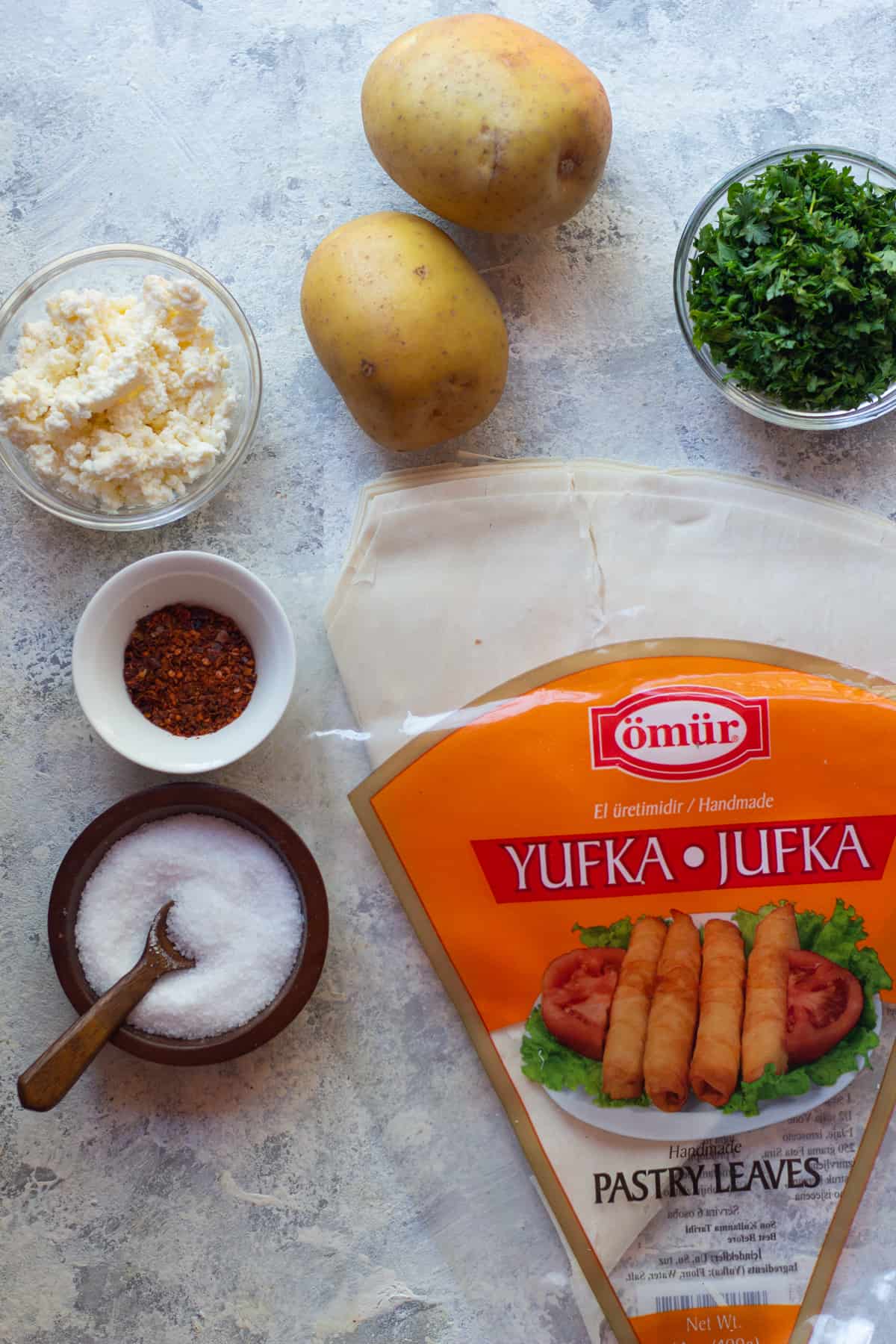 To make Turkish rolls you need yufka, cheese, potatoes, parsley, salt and pepper. 