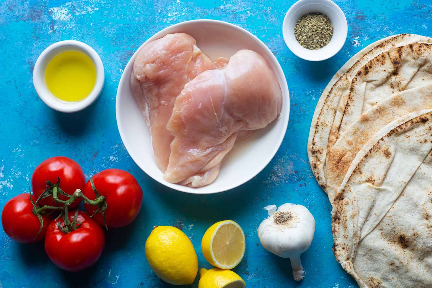 To Make chicken souvlaki you need chicken breast, oregano, lemon and garlic. 