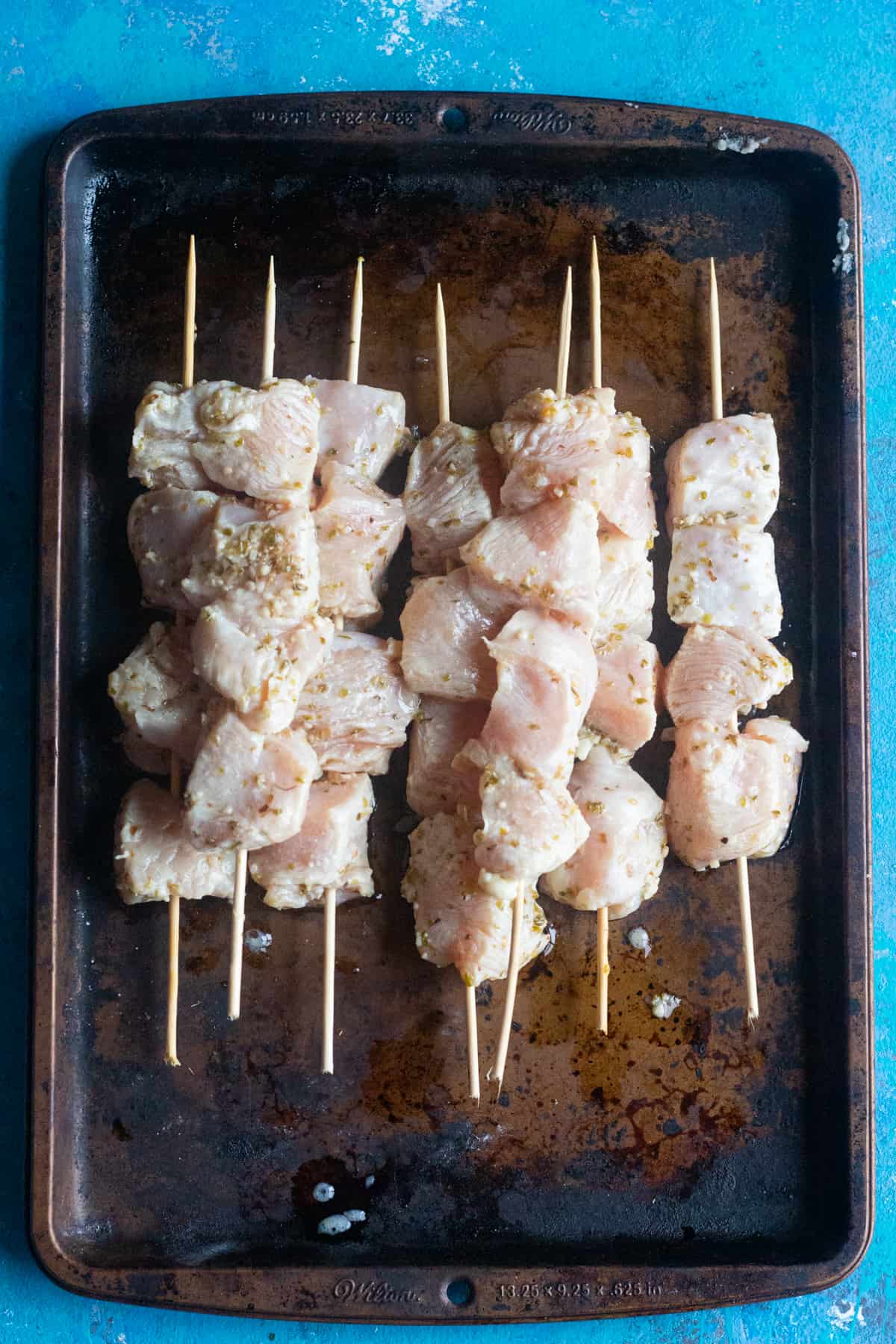 cut chicken into bite size pieces and mix it with olive oil lemon juice and spices. Marinade for at least one hour. 