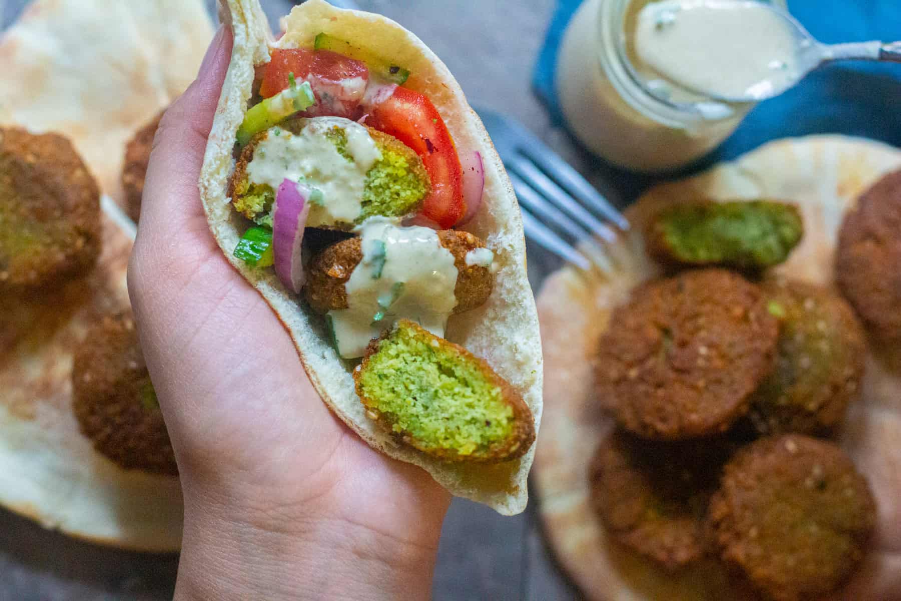 Top falafels with tahini sauce for maximum flavor. 