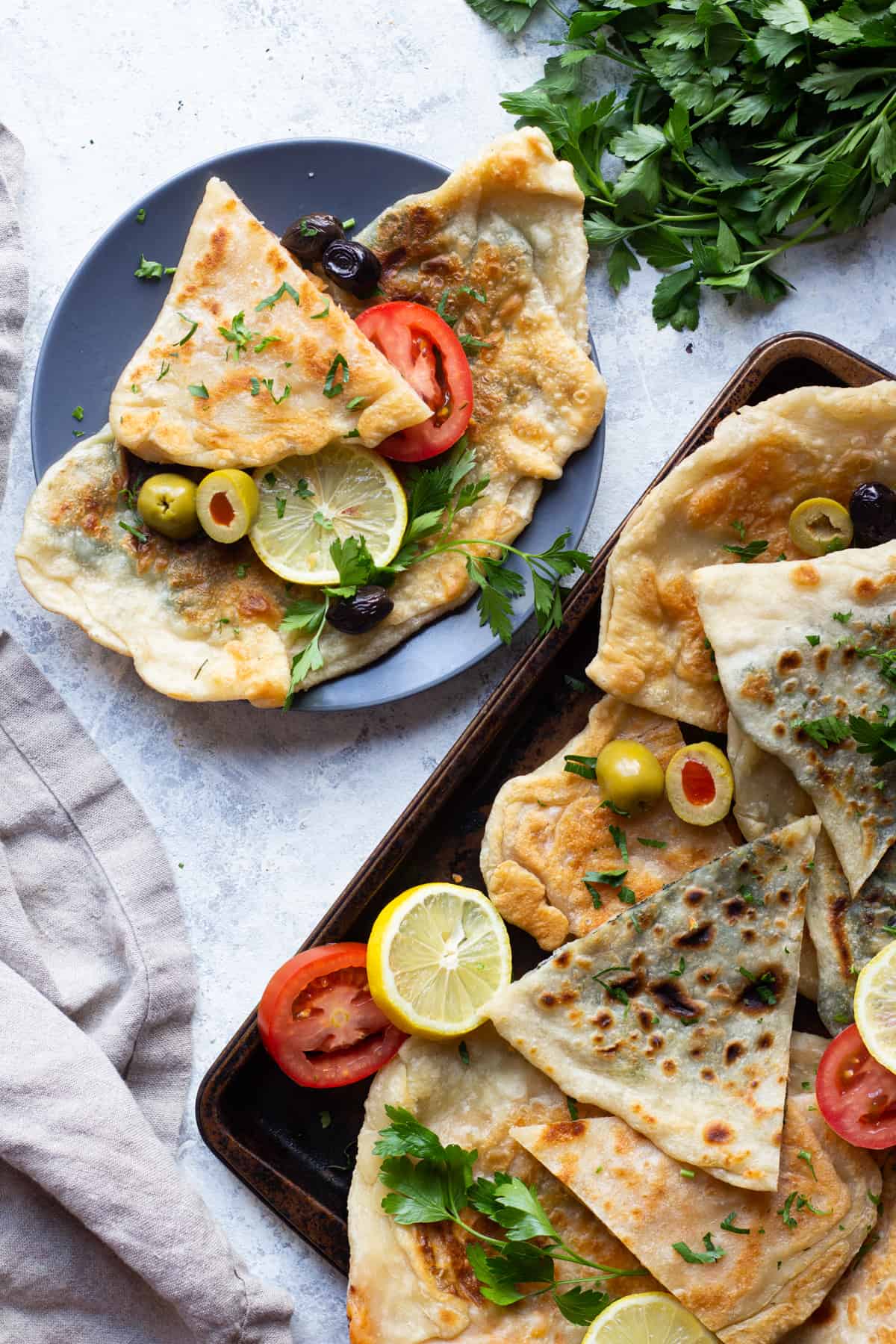 Gozleme is a delicious Turkish flatbread stuffed with different fillings such as potatoes and spinach. Watch the video to learn how to make gozleme. 