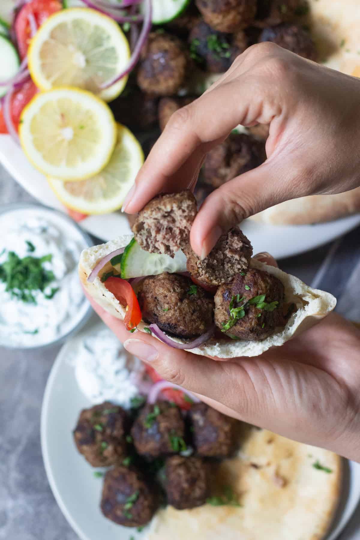 You can stuff a pita bread with Greek meatballs and vegetables. 