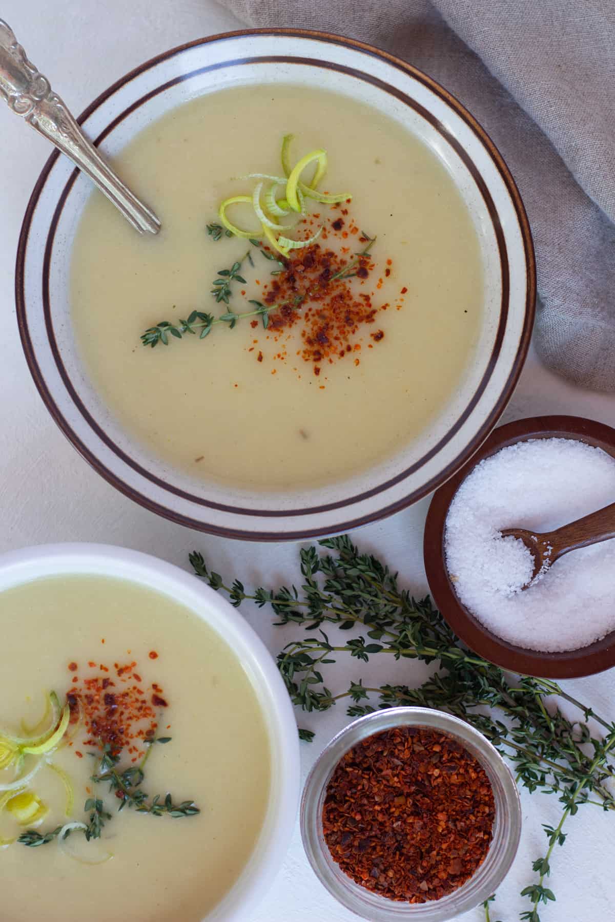 Two bowls of creamy potato soup made in instant pot. This soup recipe is very simple and easy.