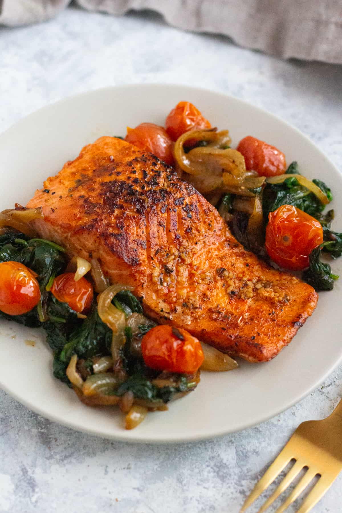 Everything you need to know about pan seared salmon. From what salmon to get to a fool proof how-to. Watch the step-by-step video tutorial to learn how to make the best pan seared salmon that's crispy on the outside and juicy on the inside. 