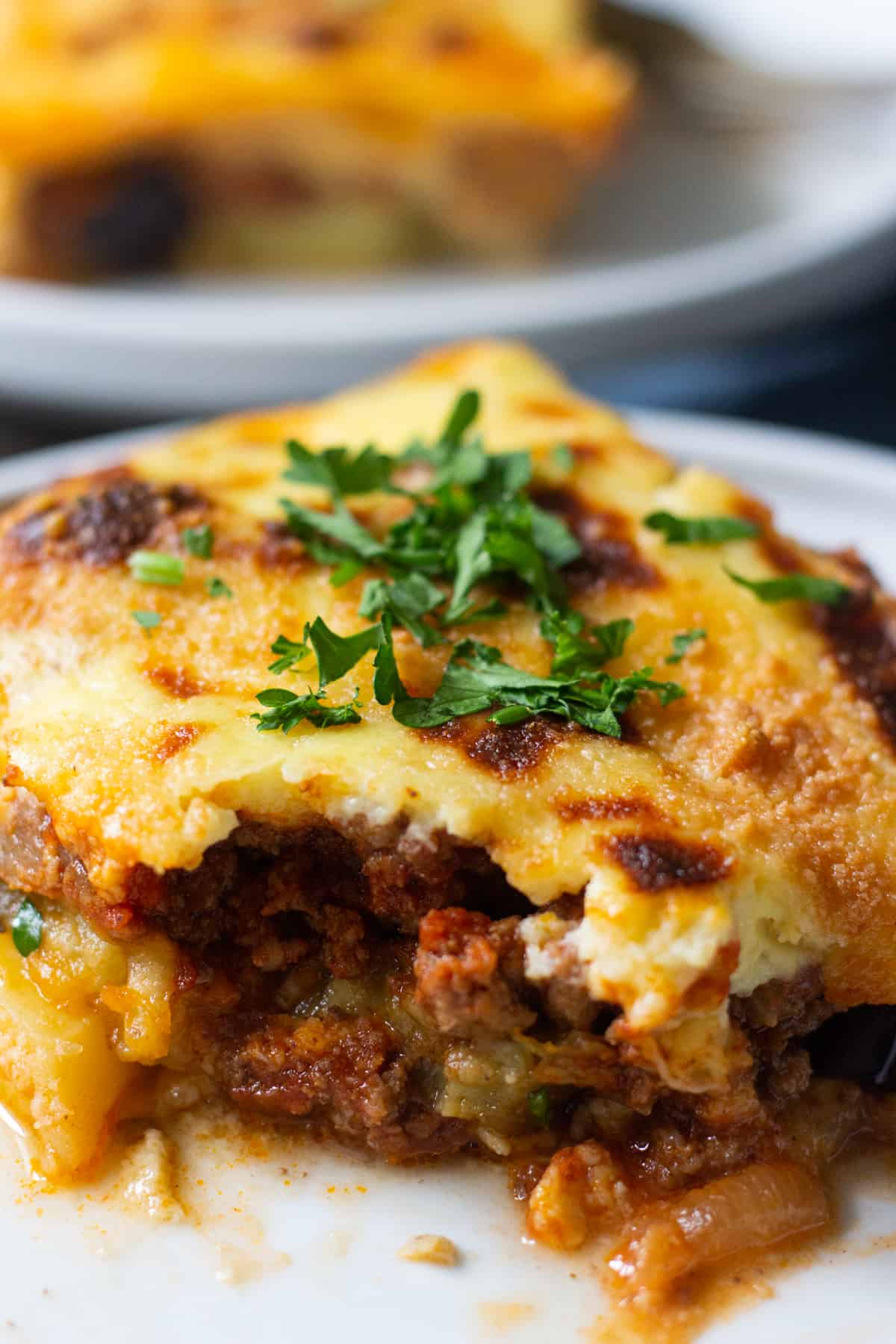 Moussaka is a classic Greek comfort food. Follow our step-by-step recipe to make this easy and comforting eggplant casserole. 
