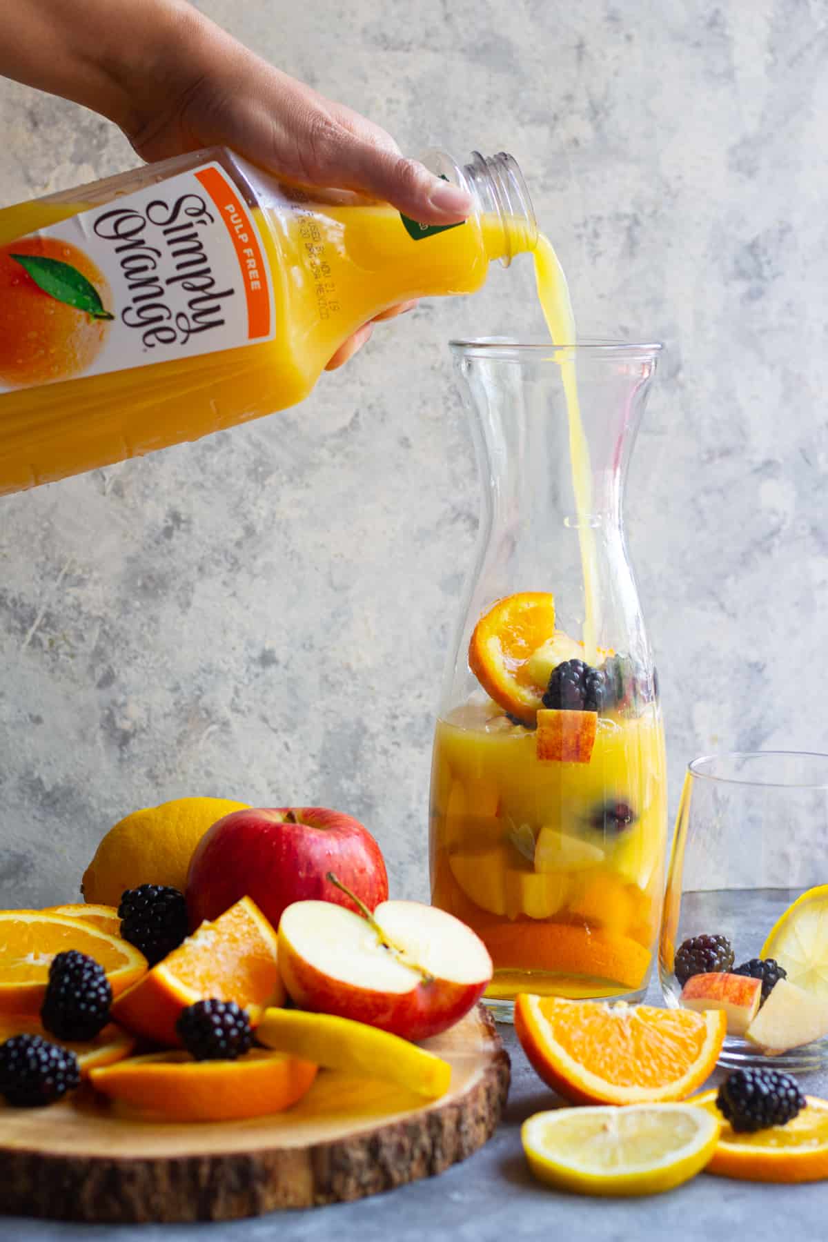 A pour shot of the orange juice. 