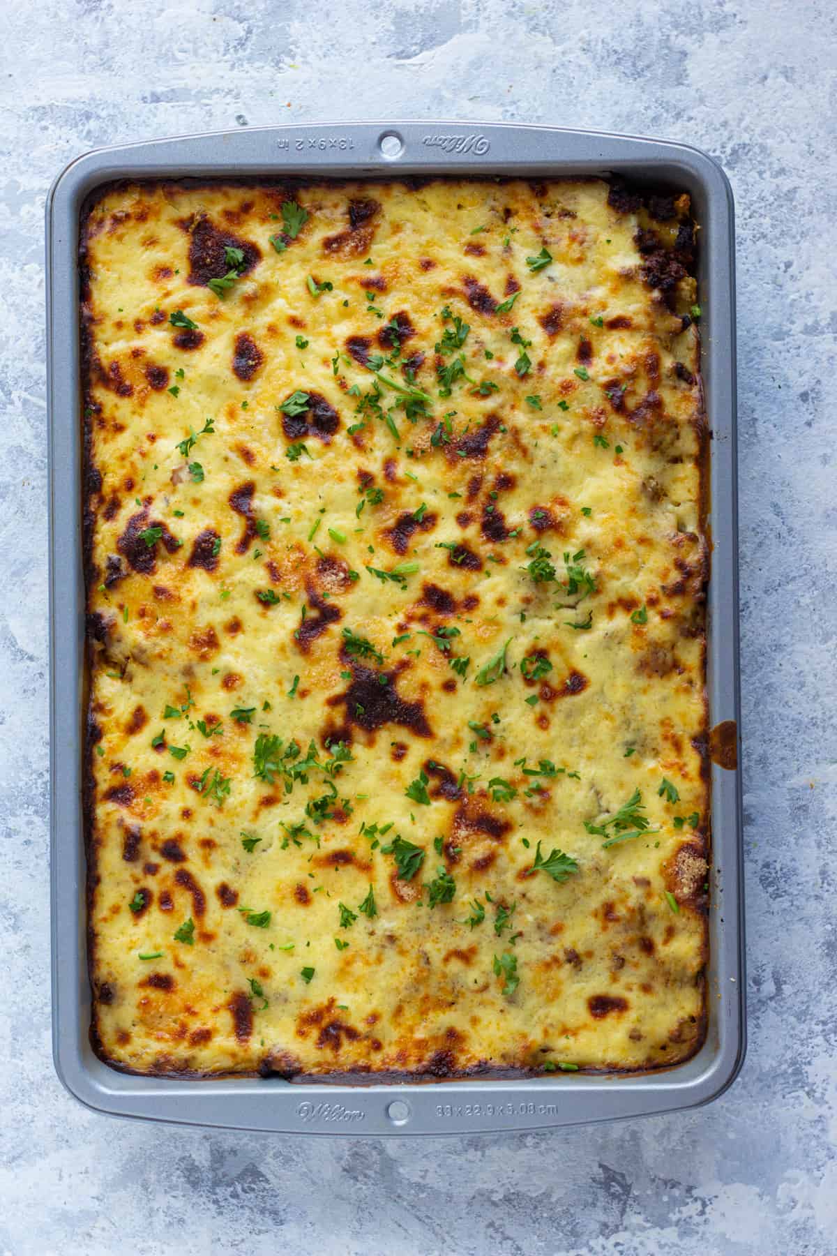 Bake pastitsio recipe in a 9x13 pan.