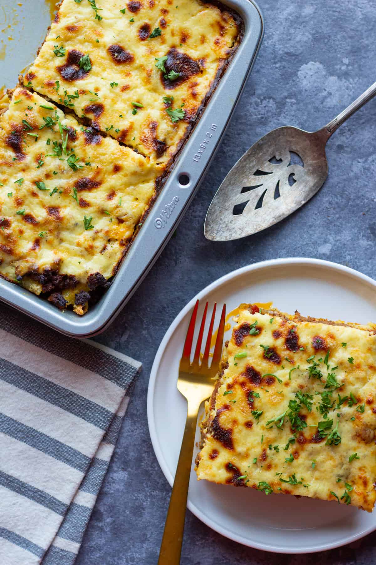 Let this Greek pasta bake cool before you slice it so the slices are clean. 
