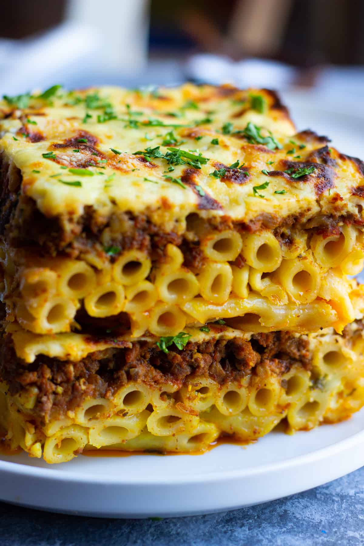 pasta topped with a ground beef sauce and bechamel sauce.