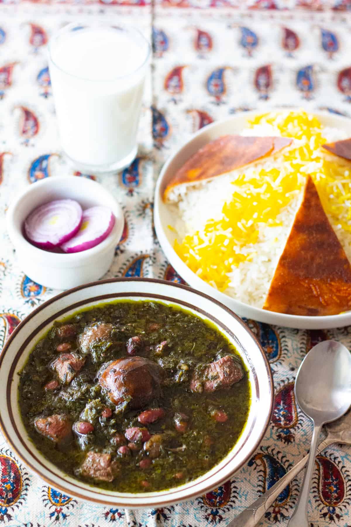 Ghormeh Sabzi or Persian herb stew is the national dish of Iran. It's made of a combination of herbs, red kidney beans and beef or lamb. It's usually served with Persian rice. 