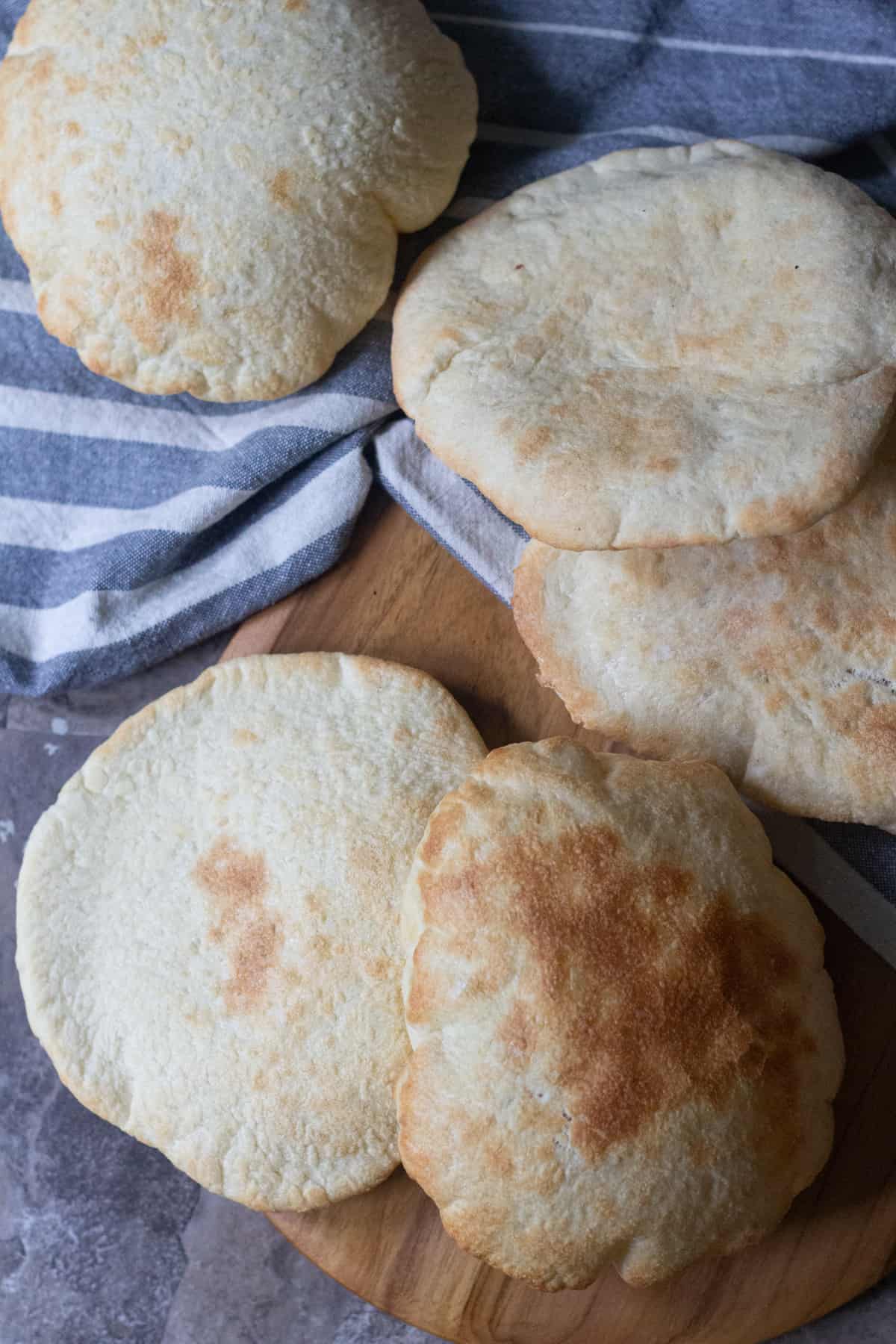 This homemade pita bread recipe is easy and makes eight pitas. 
