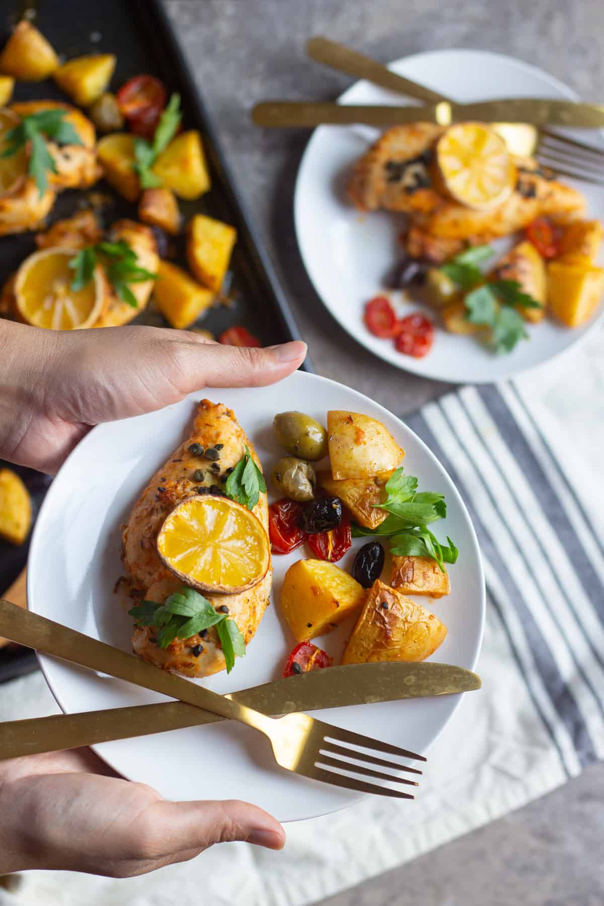 Mediterranean chicken is a delicious recipe for weeknight dinners. This sheet pan chicken and potatoes is ready in thirty minutes and is full of Mediterranean flavors!