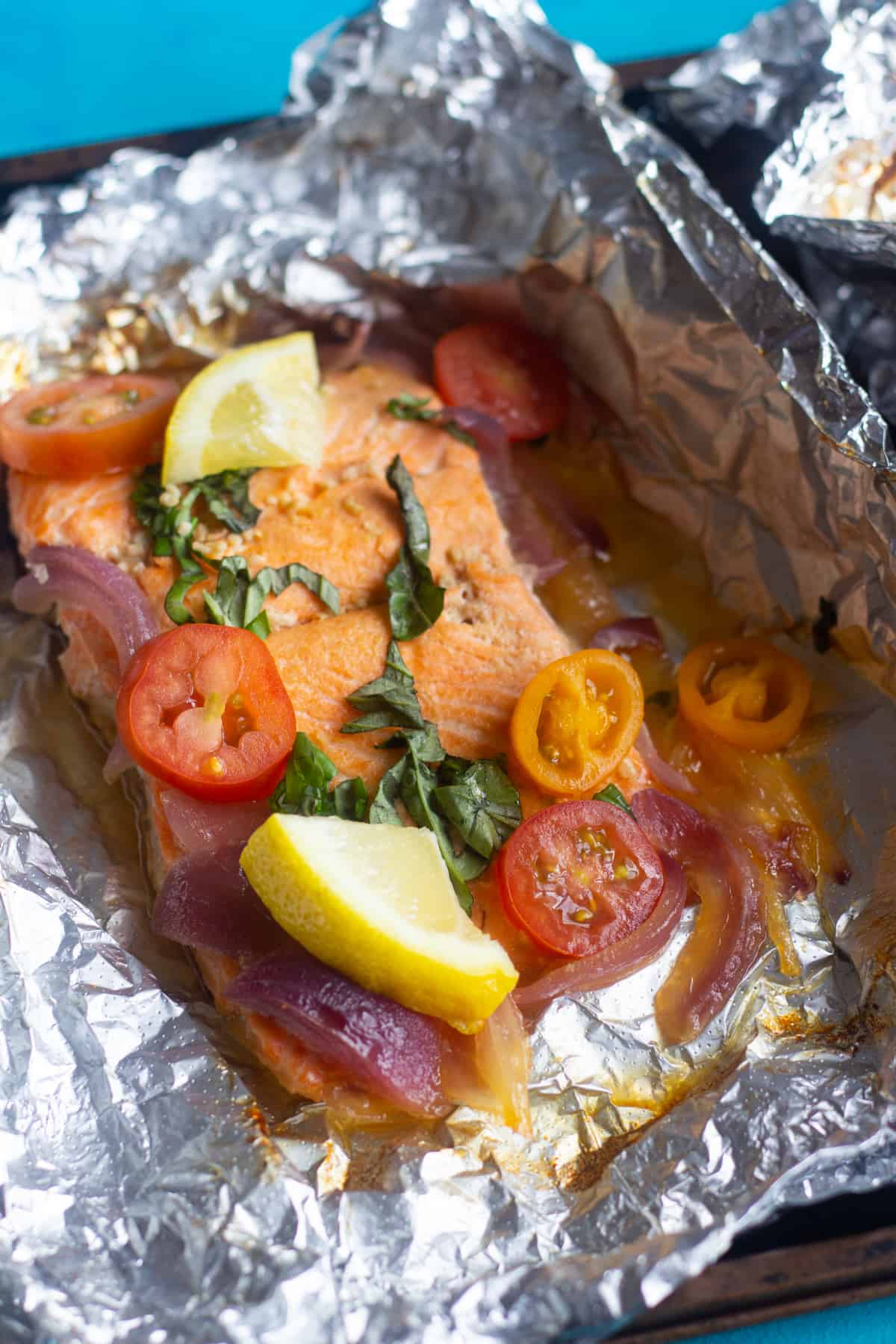 oven baked salmon in foil with onion and lemon